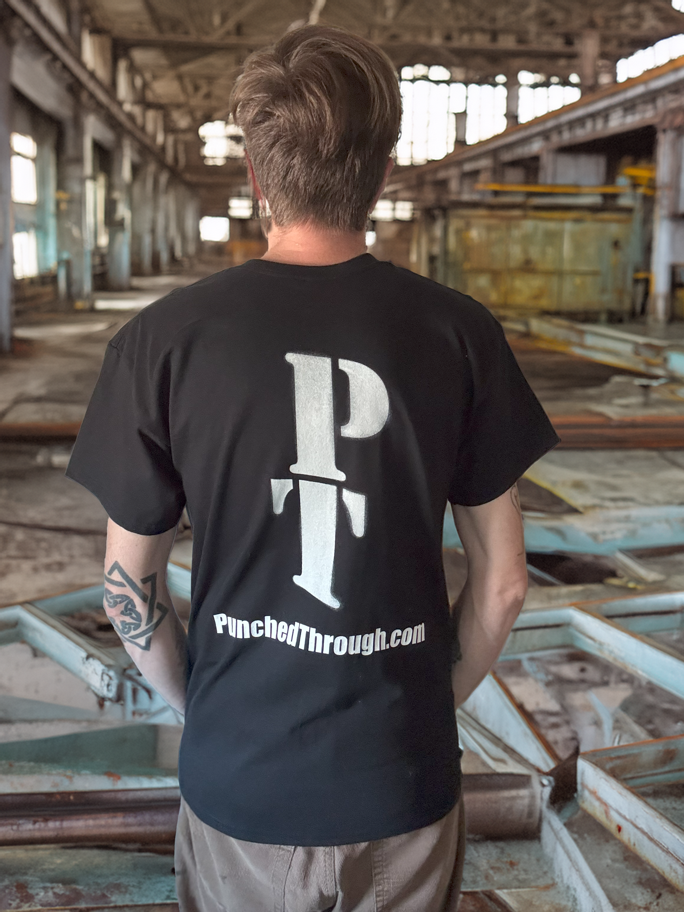 Punched Through - Case - Unisex Heavy Cotton Tee product thumbnail image Punched Through - Case - Unisex Heavy Cotton Tee product thumbnail image