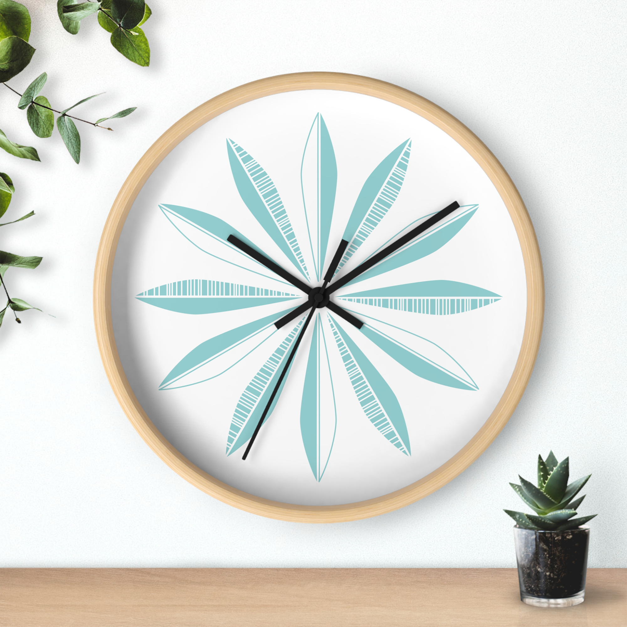 Retro Feather Wall Clock in Pool on White product thumbnail image