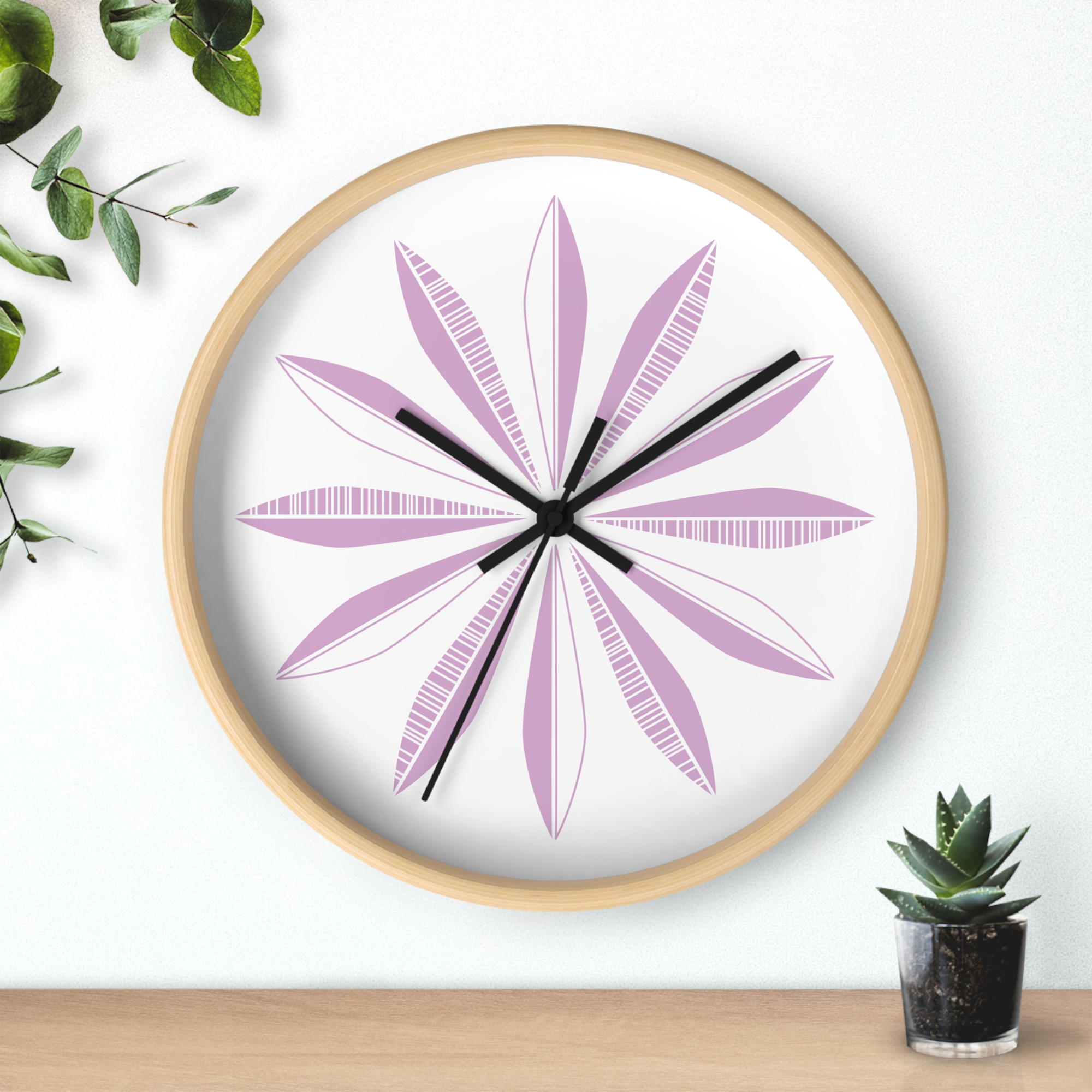 Retro Feather Wall Clock in Amethyst on White product thumbnail image Retro Feather Wall Clock in Amethyst on White product thumbnail image