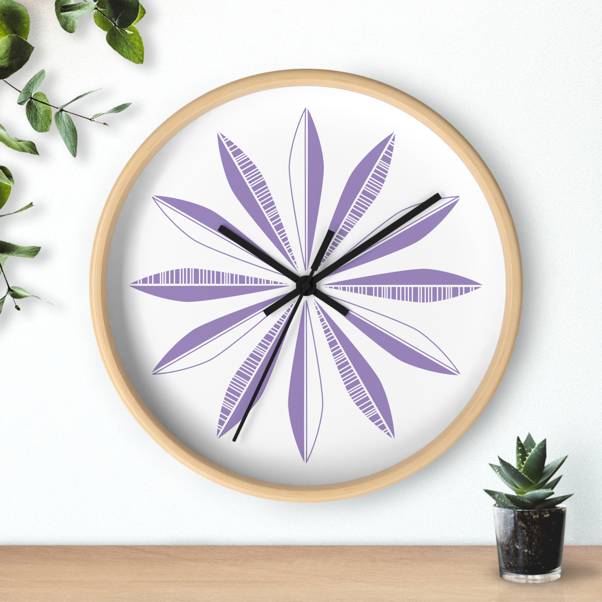 Retro Feathers Wall Clock in Grape on White product thumbnail image Retro Feathers Wall Clock in Grape on White product thumbnail image