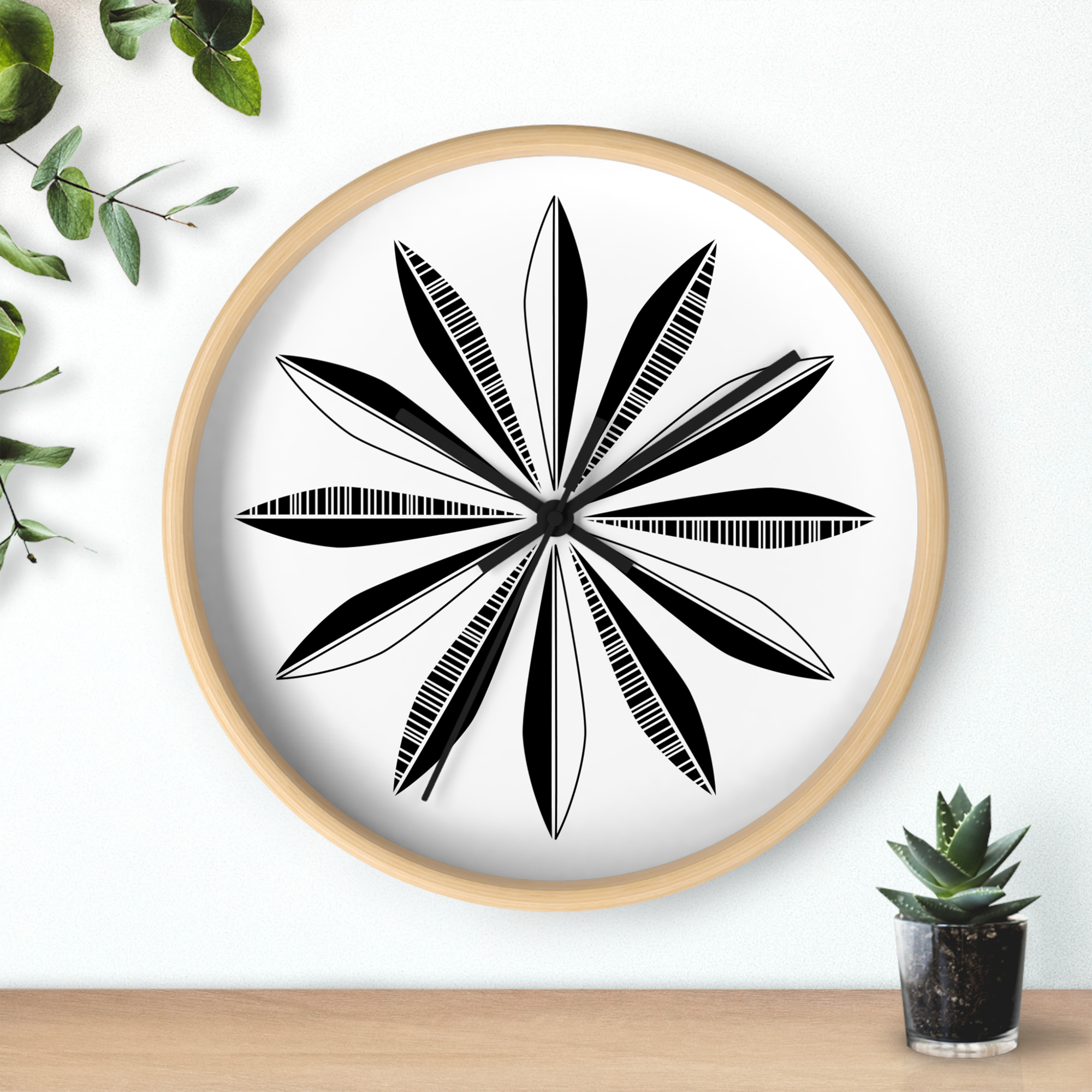 Retro Feathers Wall Clock in Licorice on White product thumbnail image Retro Feathers Wall Clock in Licorice on White product thumbnail image