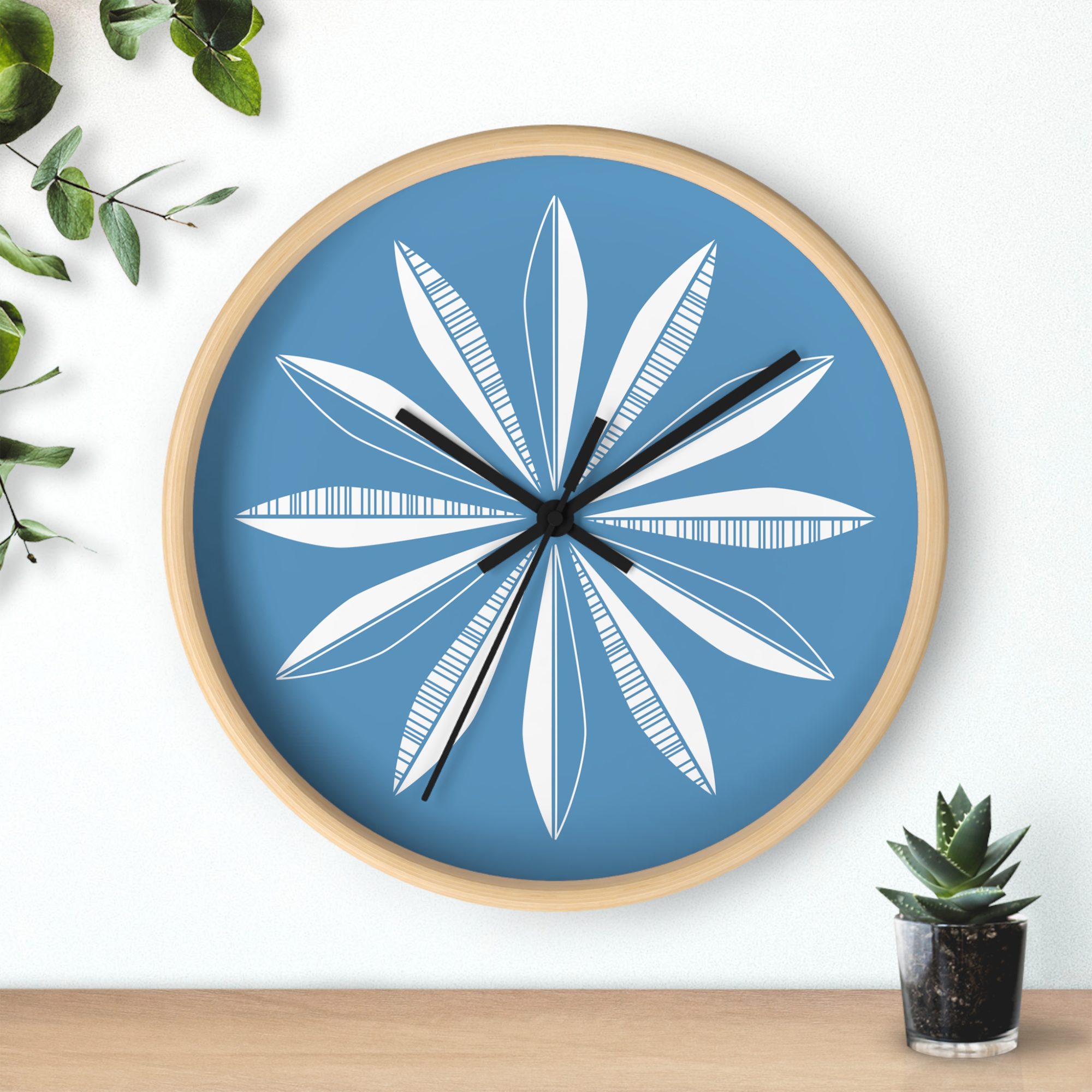 Retro Feathers Wall Clock in Denim product thumbnail image Retro Feathers Wall Clock in Denim product thumbnail image