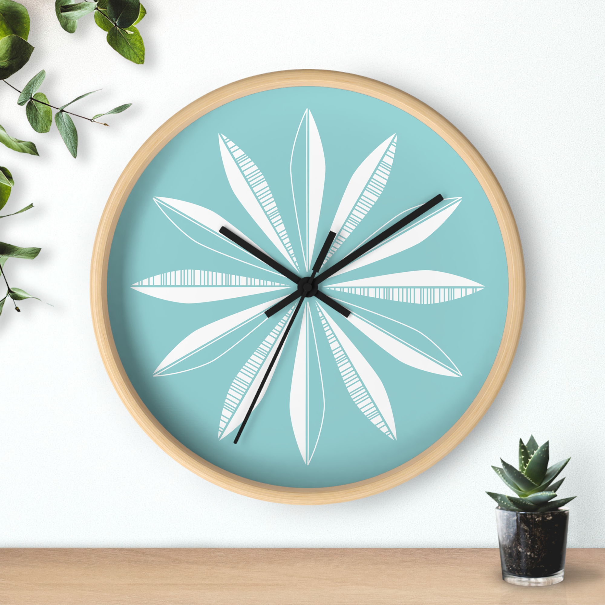 Retro Feathers Wall Clock in Pool product thumbnail image Retro Feathers Wall Clock in Pool product thumbnail image