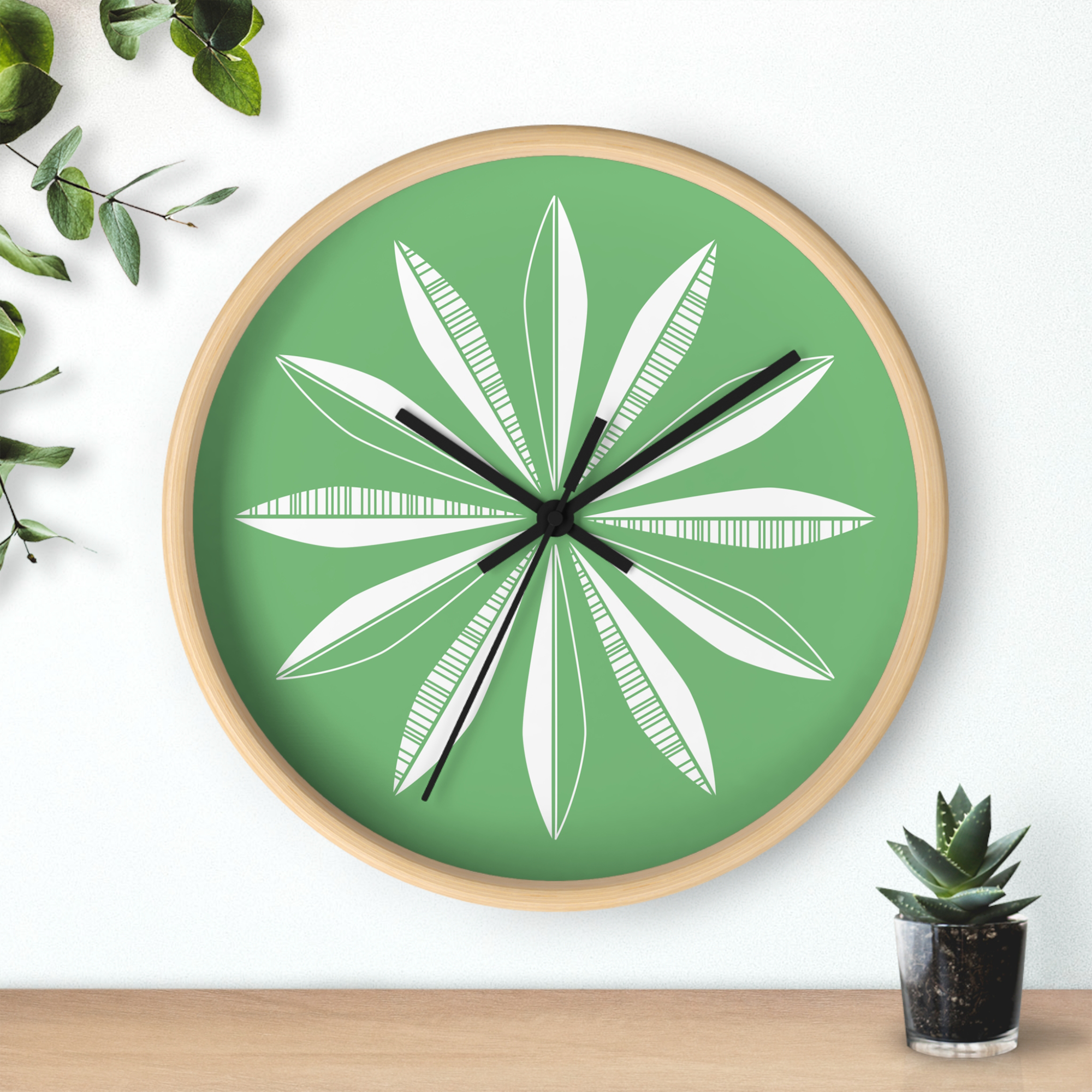 Retro Feathers Wall Clock in Turf product thumbnail image Retro Feathers Wall Clock in Turf product thumbnail image