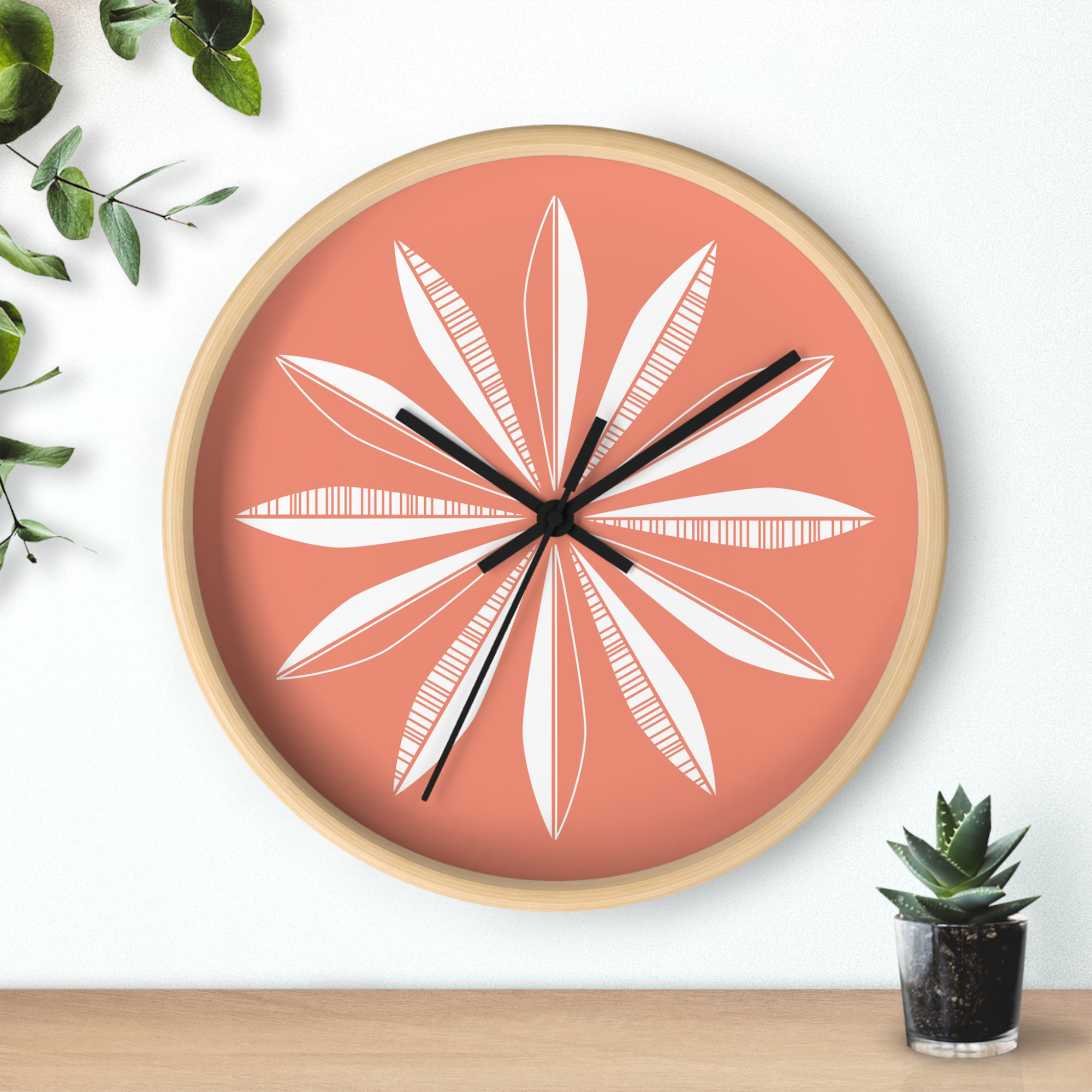 Retro Feathers Wall Clock in Grapefruit product thumbnail image Retro Feathers Wall Clock in Grapefruit product thumbnail image