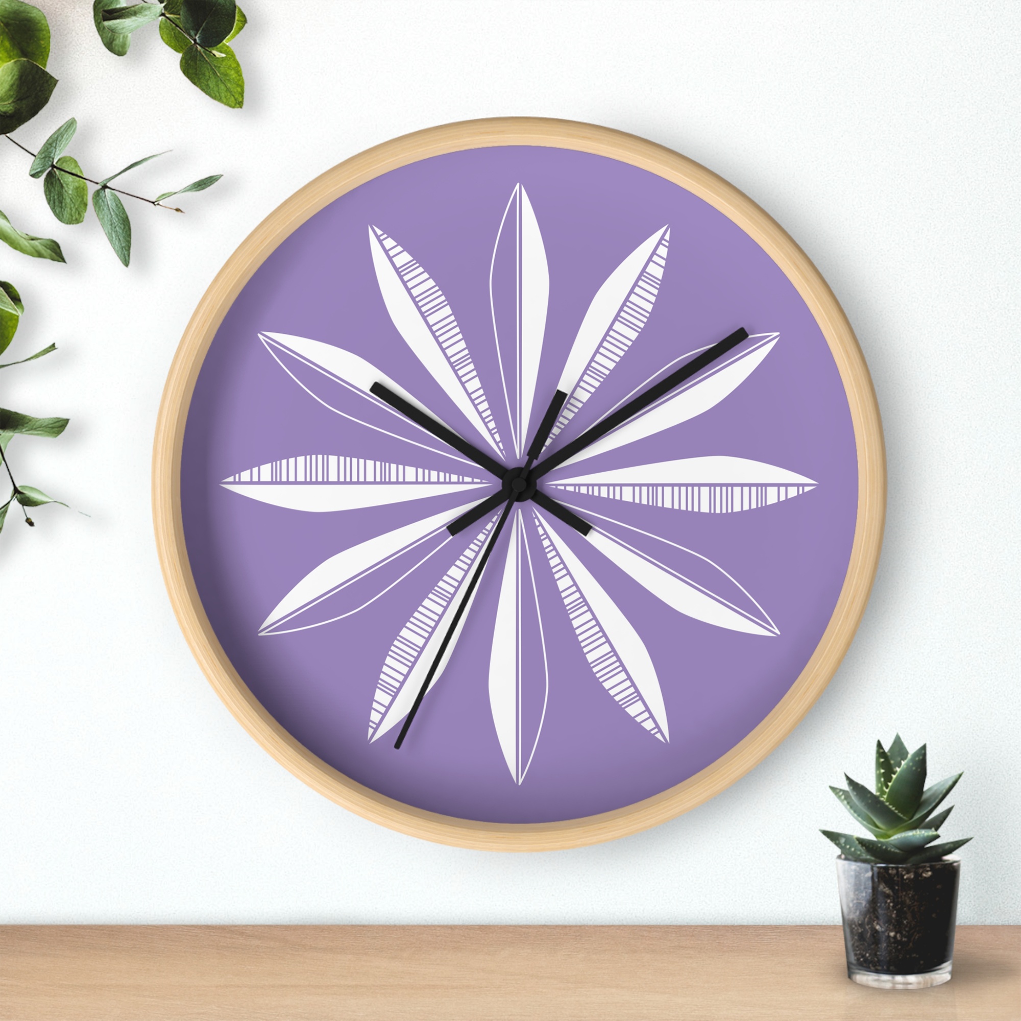 Retro Feathers Wall Clock in Grape product thumbnail image Retro Feathers Wall Clock in Grape product thumbnail image