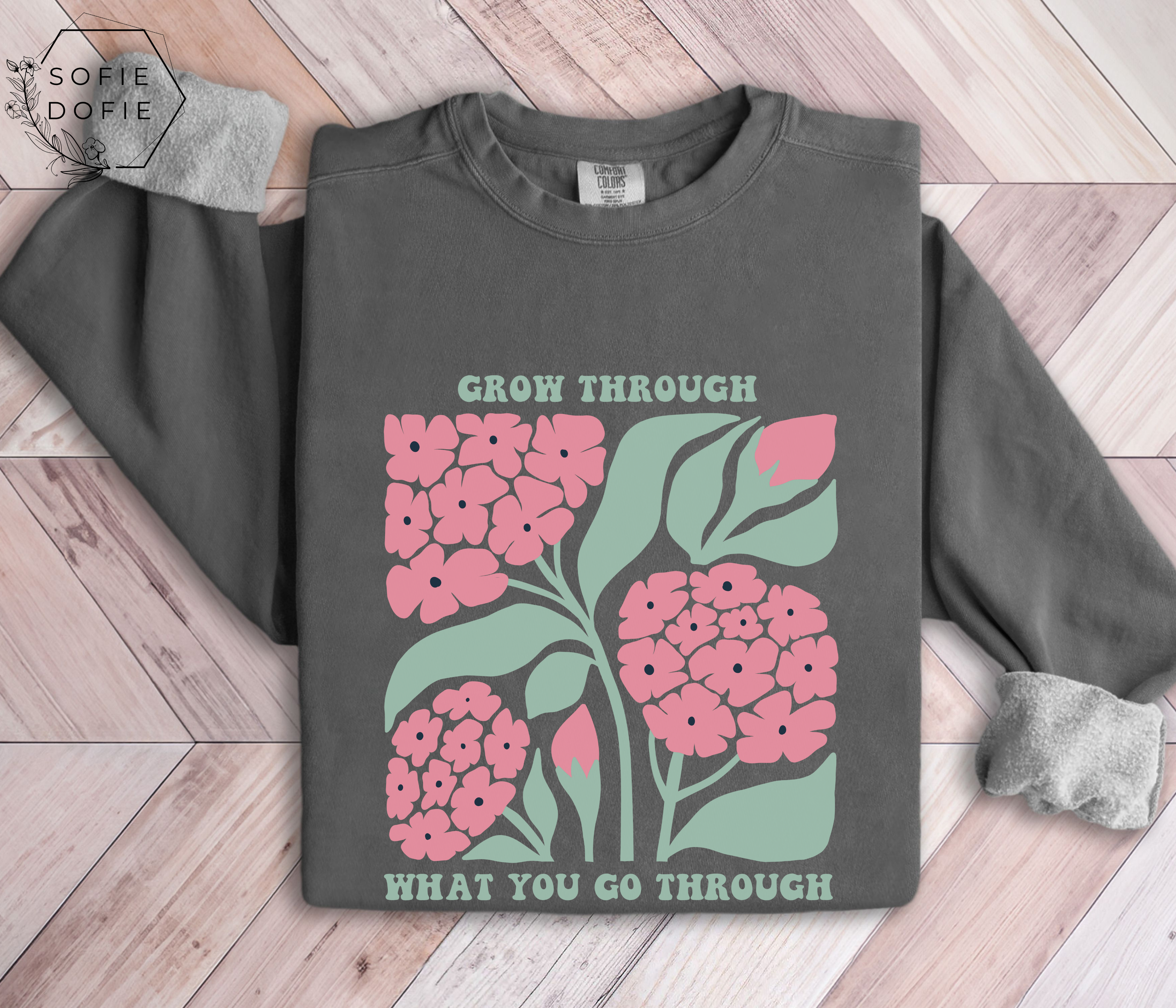 Grow Through What You Go Through Unisex Garment-Dyed Sweatshirt product thumbnail image Grow Through What You Go Through Unisex Garment-Dyed Sweatshirt product thumbnail image
