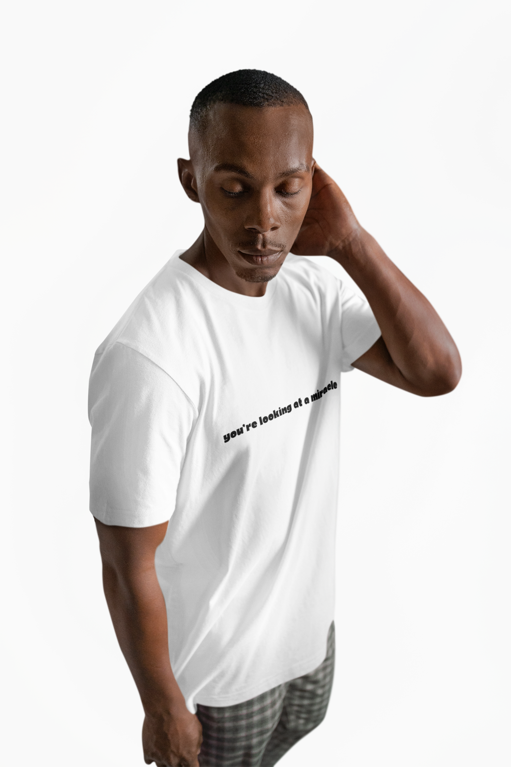You're Looking at A Miracle Unisex T-shirt product thumbnail image You're Looking at A Miracle Unisex T-shirt product thumbnail image