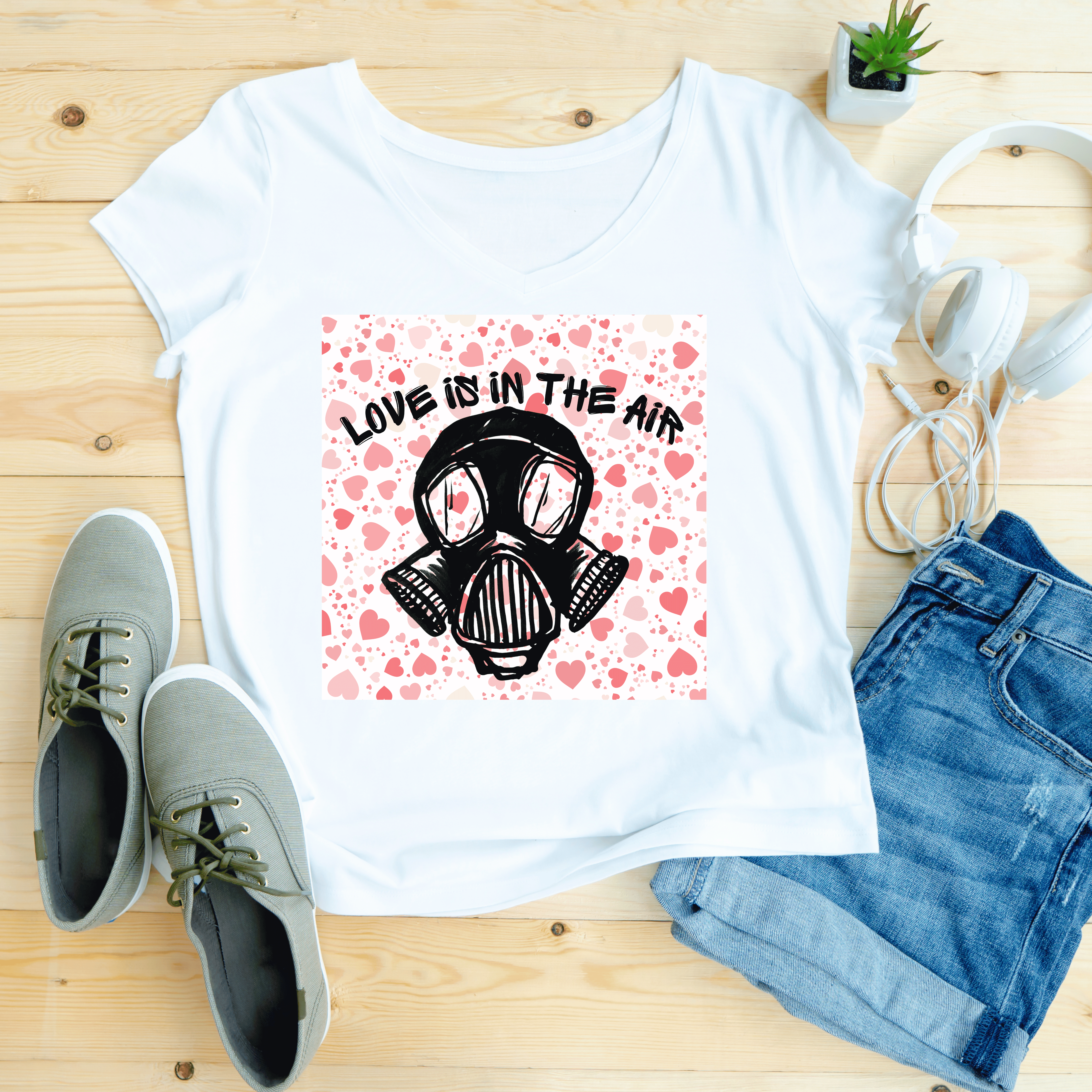 Edgy Graphic Tee, Love is in the Air Shirt, Unisex Casual Wear, Trendy Valentine's Day Gift, Fashionable Statement Top product thumbnail image Edgy Graphic Tee, Love is in the Air Shirt, Unisex Casual Wear, Trendy Valentine's Day Gift, Fashionable Statement Top product thumbnail image