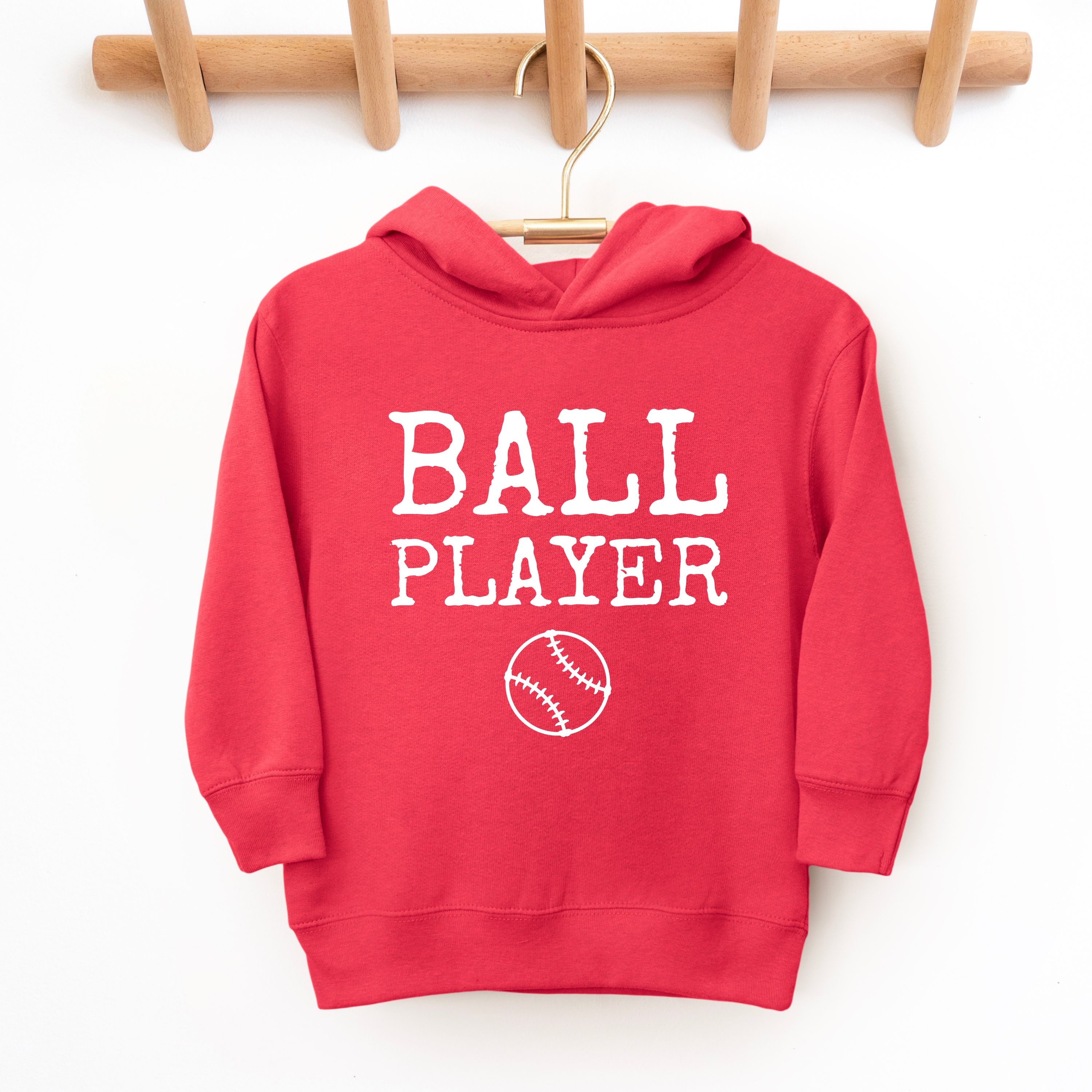 Ball Player Toddler Hoodie product thumbnail image Ball Player Toddler Hoodie product thumbnail image