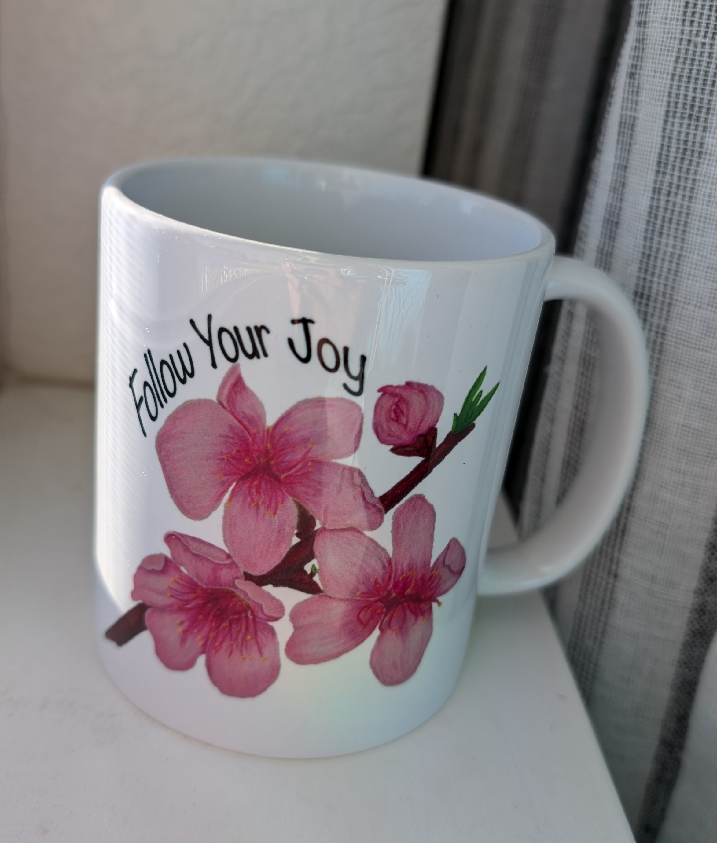 Peach Blossom "Follow Your Joy" Ceramic Mug, (11oz, 15oz) product thumbnail image Peach Blossom "Follow Your Joy" Ceramic Mug, (11oz, 15oz) product thumbnail image