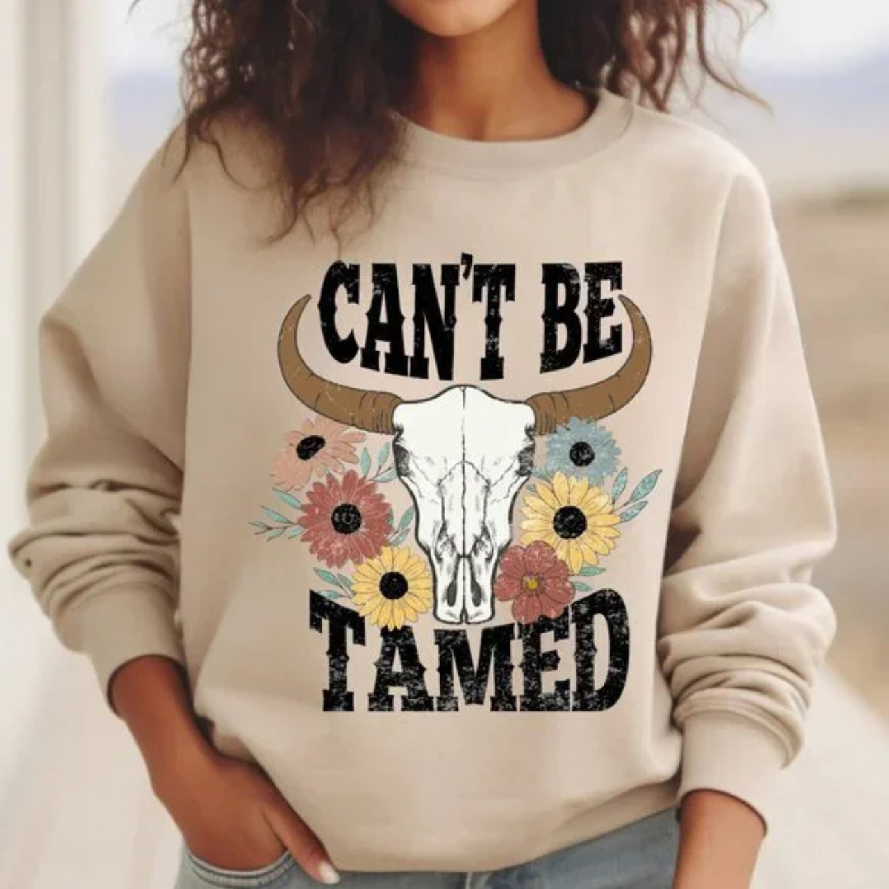 Bohemian Western Floral Longhorn CAN'T BE TAMED Long Sleeve Sweatshirt product thumbnail image Bohemian Western Floral Longhorn CAN'T BE TAMED Long Sleeve Sweatshirt product thumbnail image