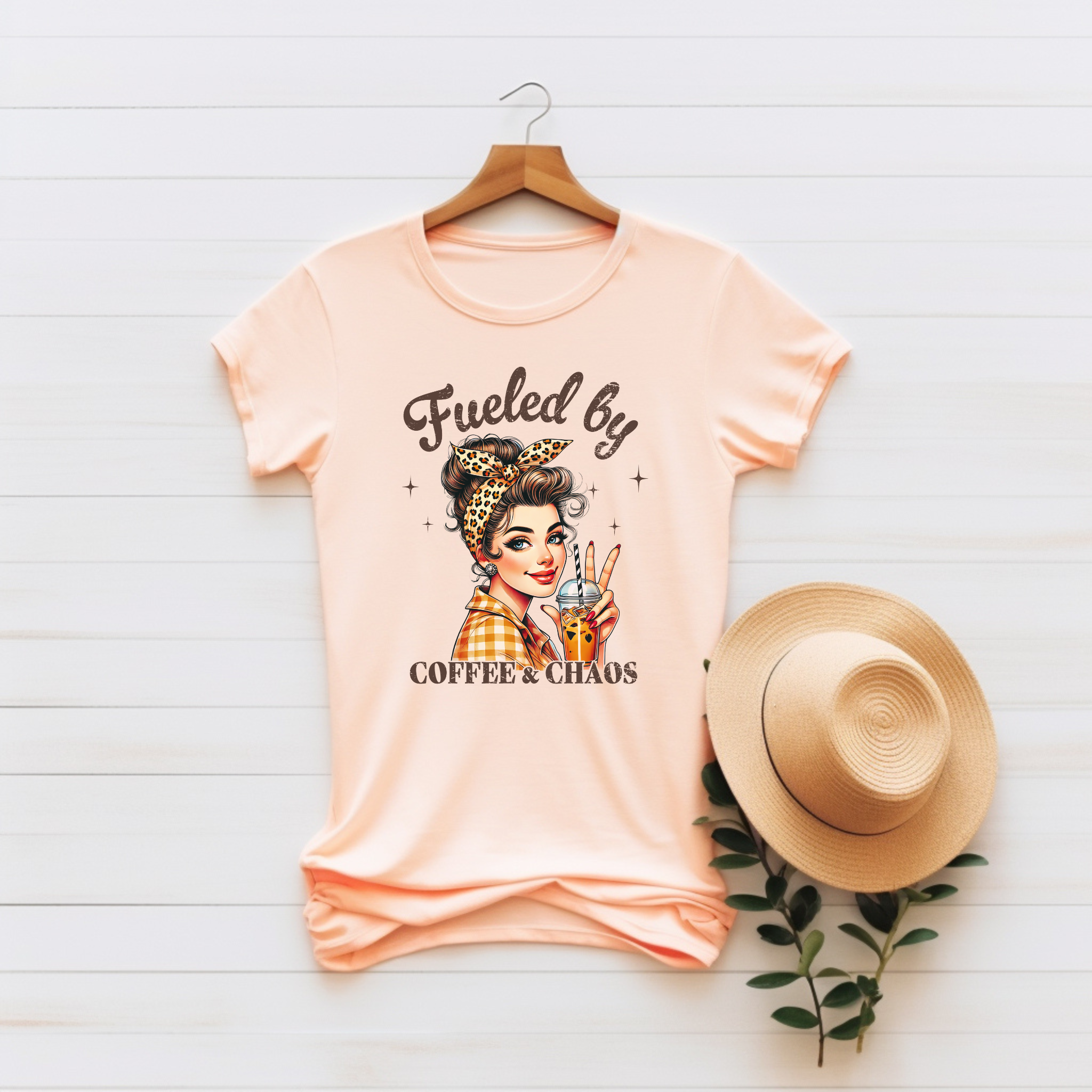 “Fueled by Coffee & Chaos” Unisex Graphic Tee product thumbnail image “Fueled by Coffee & Chaos” Unisex Graphic Tee product thumbnail image