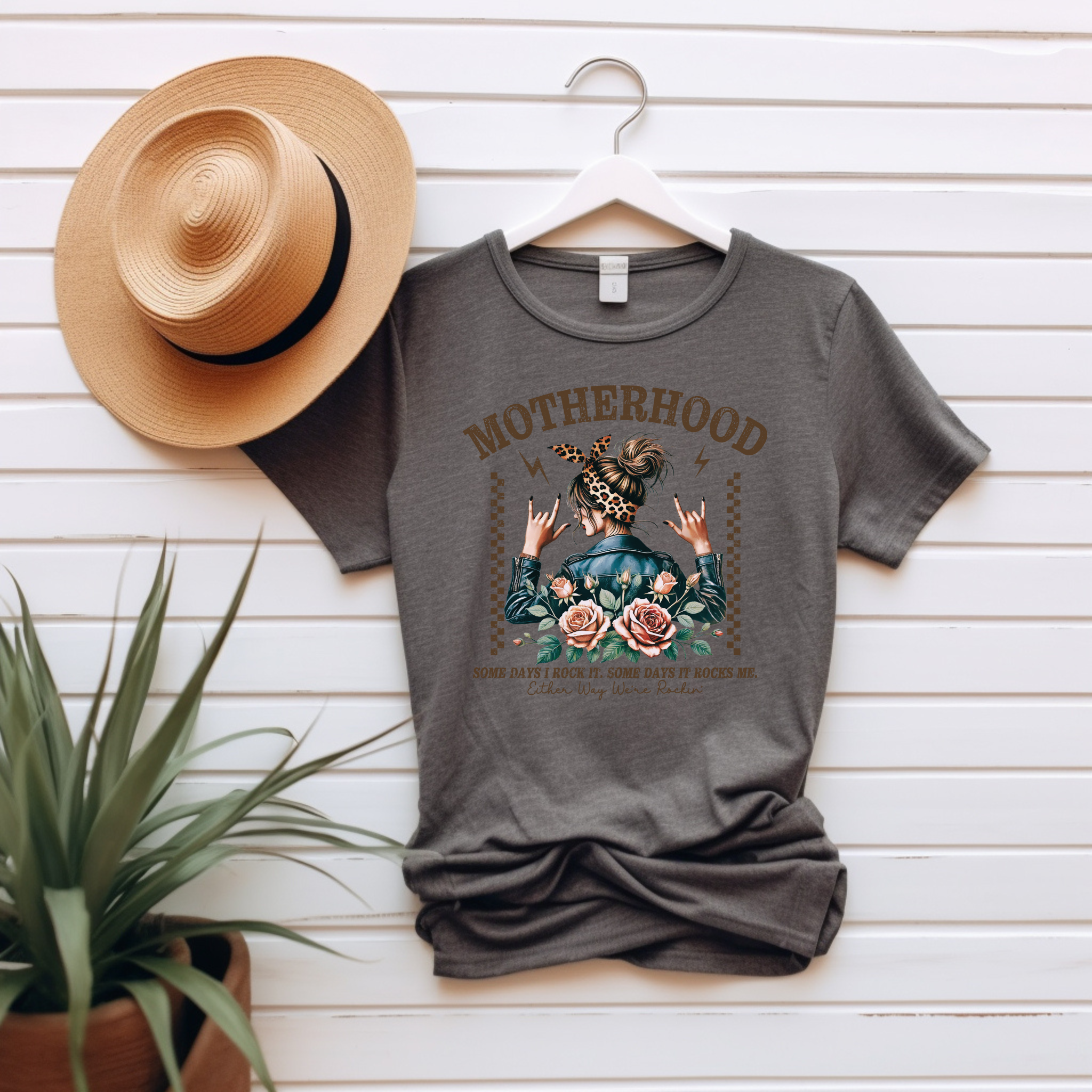 “Motherhood – Some Days I Rock It, Some Days It Rocks Me” Unisex Graphic Tee