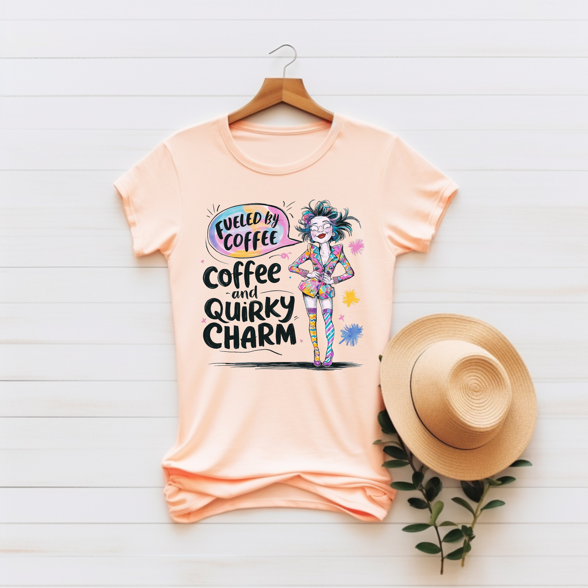 “Fueled by Coffee and Quirky Charm” Unisex Graphic Tee product thumbnail image