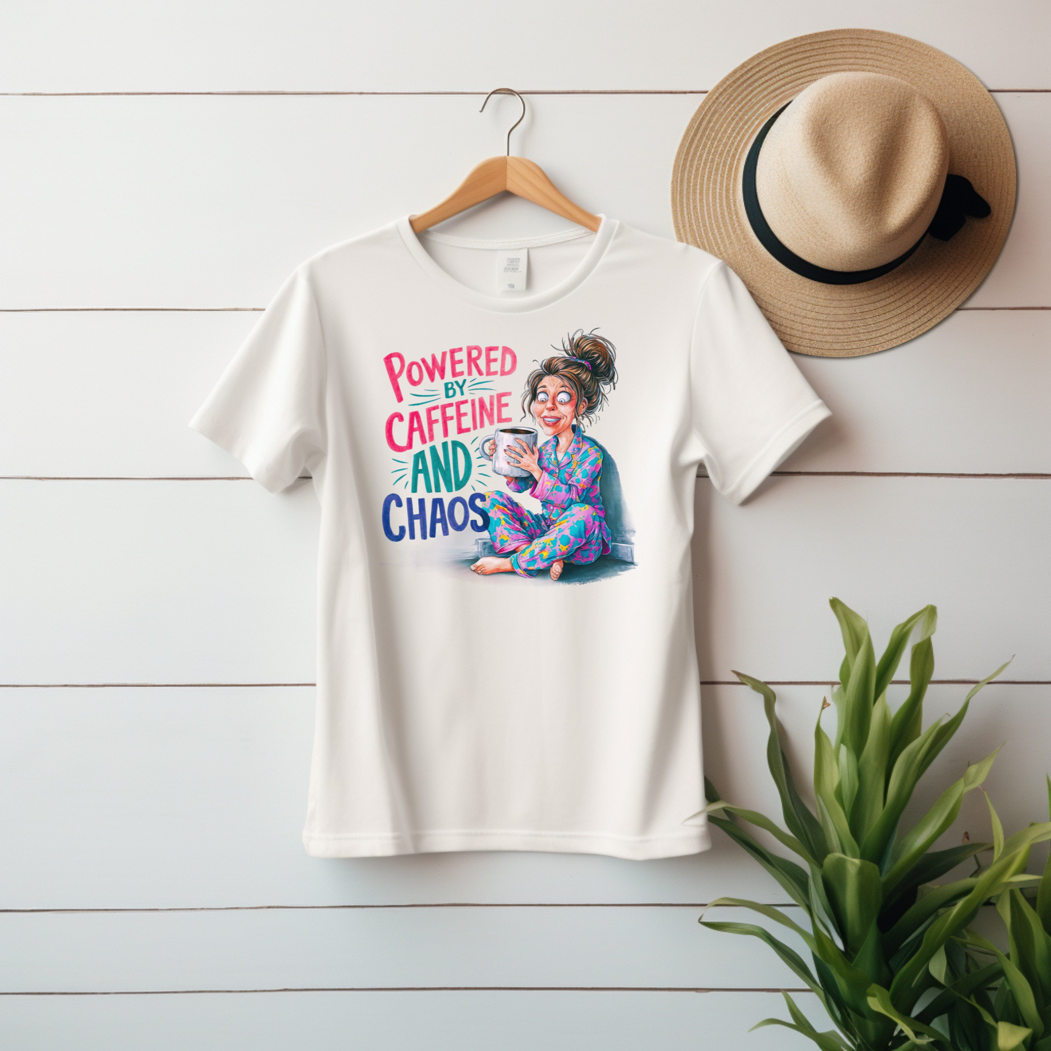 “Powered by Caffeine and Chaos” Unisex Graphic Tee product thumbnail image
