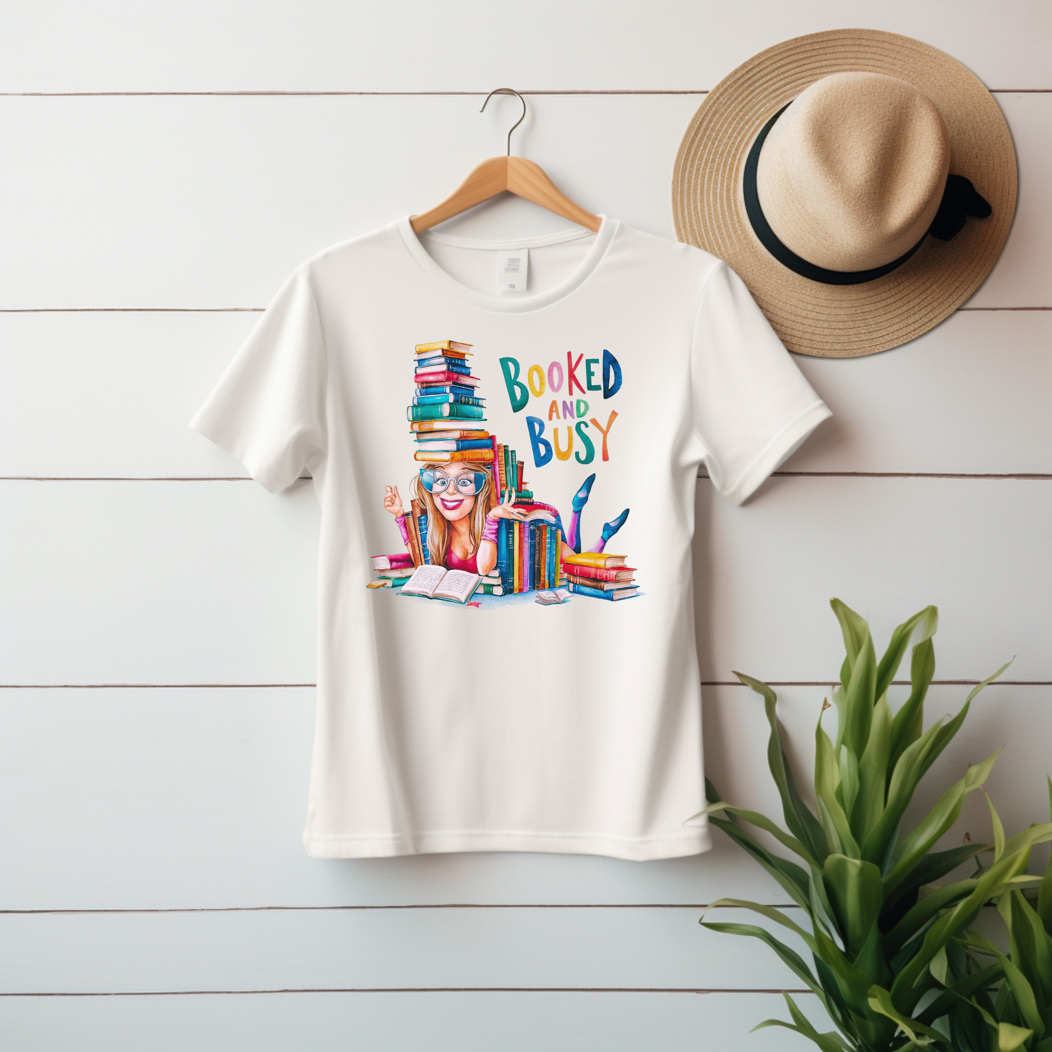 “Booked and Busy” Unisex Graphic Tee product thumbnail image “Booked and Busy” Unisex Graphic Tee product thumbnail image