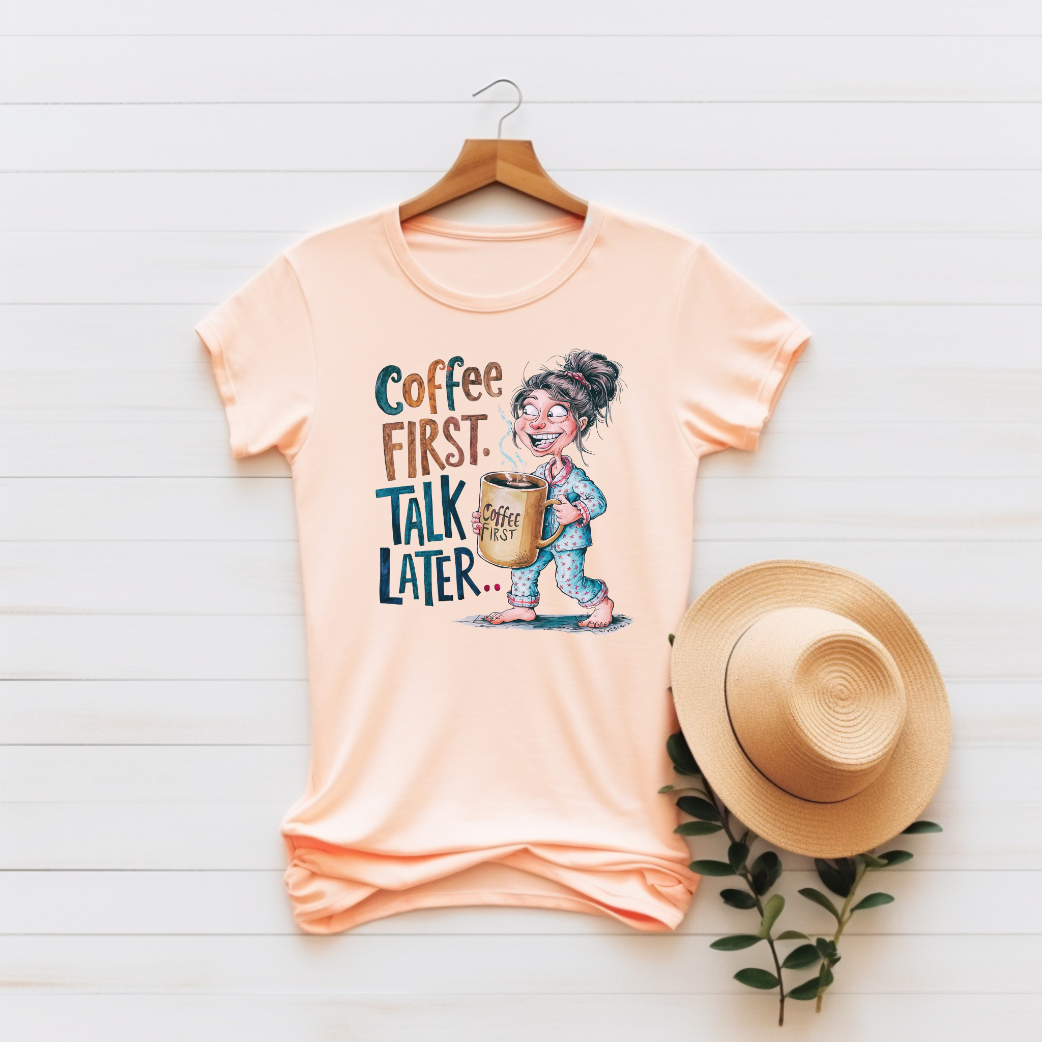 “Coffee First. Talk Later…” Unisex Graphic Tee product thumbnail image
