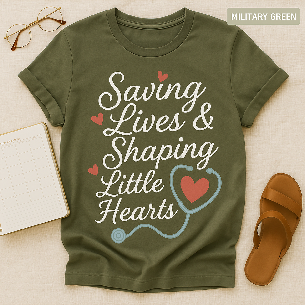 Saving Lives & Shaping Little Hearts Unisex T-Shirt, Nurse Gift, Medical Worker Shirt, Healthcare Hero Tee, Hospital Staff Top, Doctor product thumbnail image Saving Lives & Shaping Little Hearts Unisex T-Shirt, Nurse Gift, Medical Worker Shirt, Healthcare Hero Tee, Hospital Staff Top, Doctor product thumbnail image