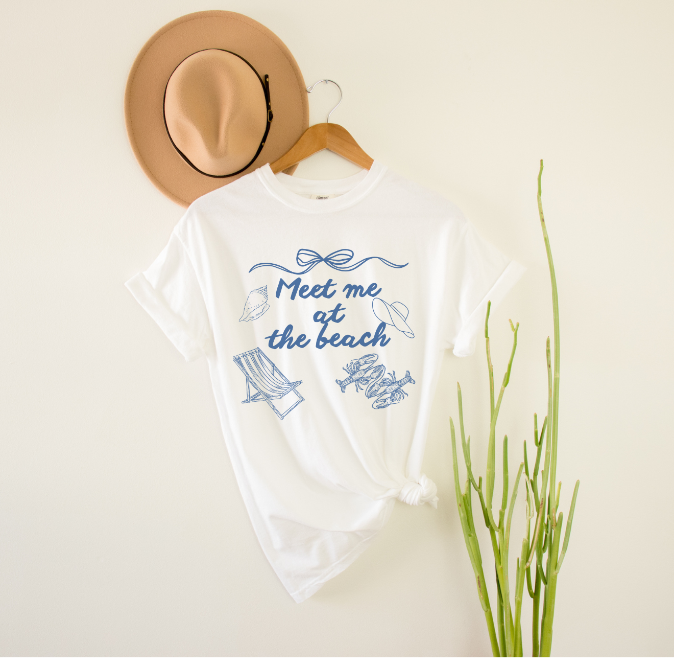 Meet Me at the Beach Graphic Tee product thumbnail image Meet Me at the Beach Graphic Tee product thumbnail image
