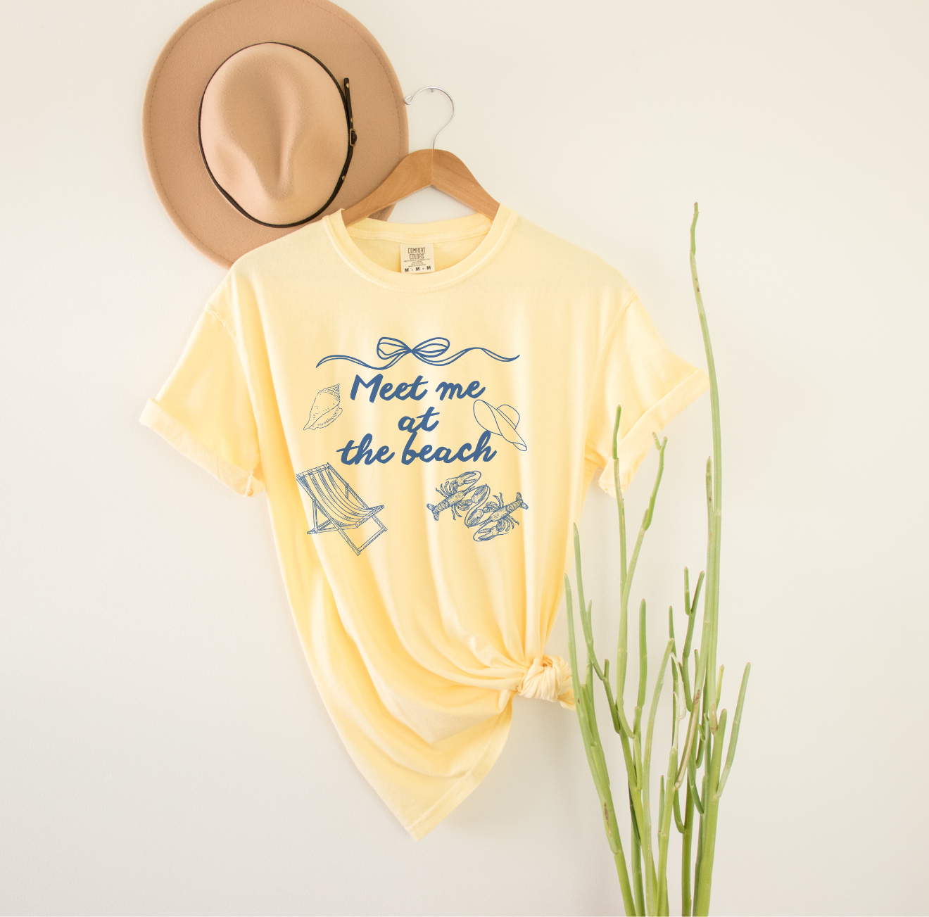 Meet Me at the Beach Graphic Tee product thumbnail image Meet Me at the Beach Graphic Tee product thumbnail image