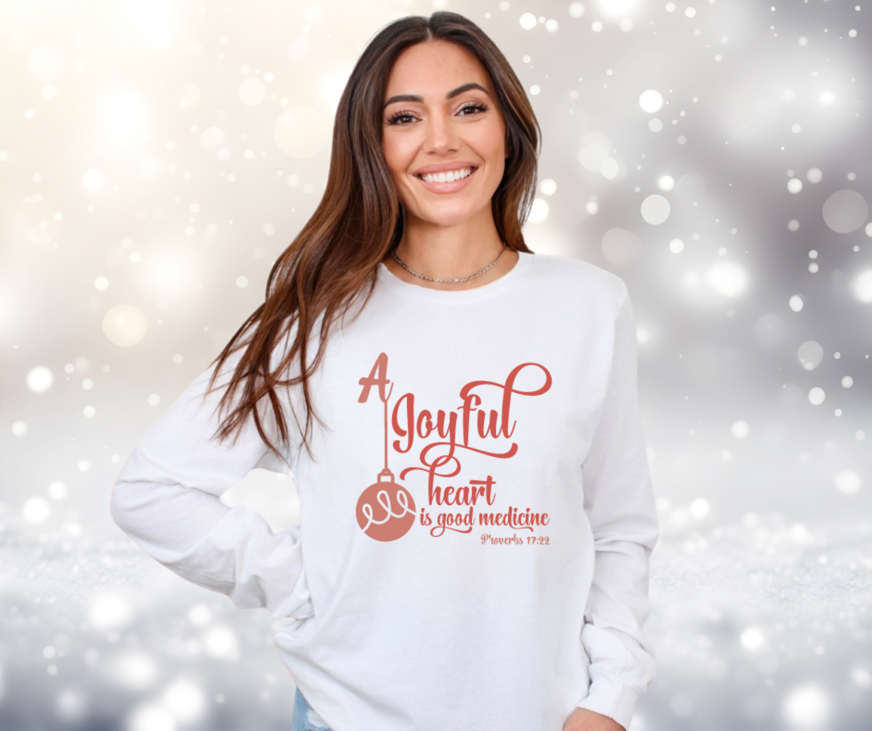 A Joyful Heart is Good Medicine Proverbs 17:22 Bible Verse Christmas Tee Gildan Ultra Cotton Long Sleeve Tee, Christmas T-Shirt