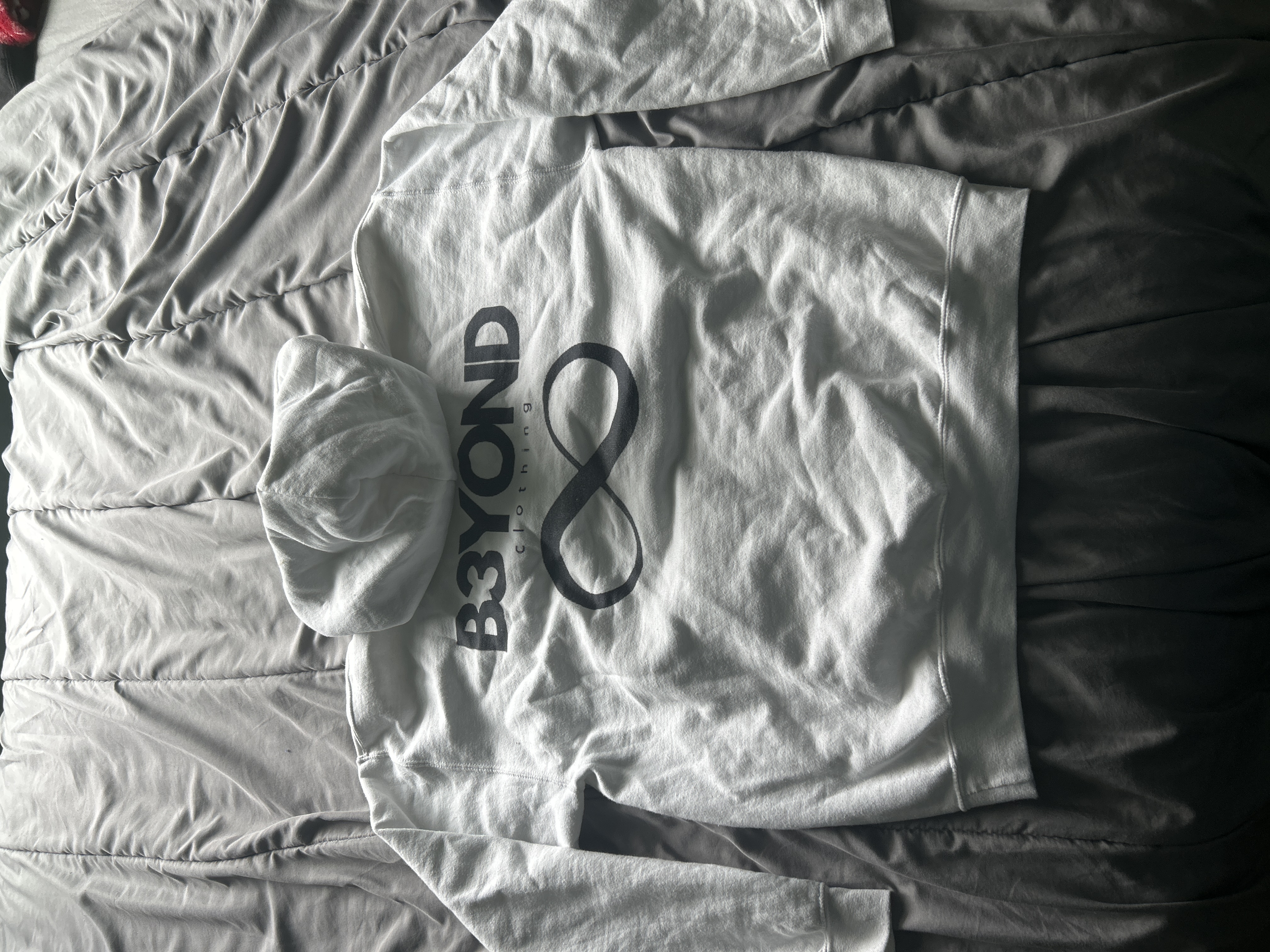 White Unisex B3YOND Hoodie product thumbnail image White Unisex B3YOND Hoodie product thumbnail image