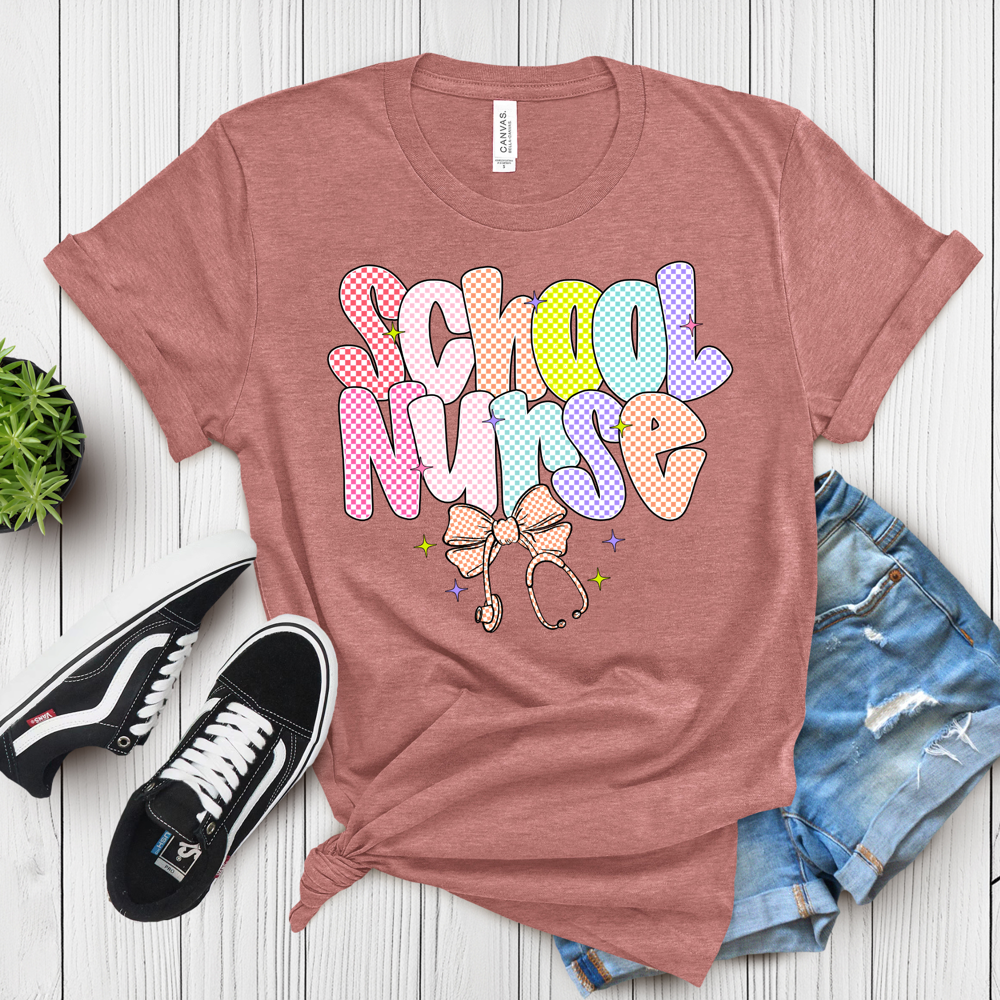 School Nurse T-Shirt | Colorful Checkered Nurse Tee | Cute Nurse Appreciation Shirt | Back to School Gift | Nurse Squad Shirt | Retro Nurse Tee product thumbnail image School Nurse T-Shirt | Colorful Checkered Nurse Tee | Cute Nurse Appreciation Shirt | Back to School Gift | Nurse Squad Shirt | Retro Nurse Tee product thumbnail image