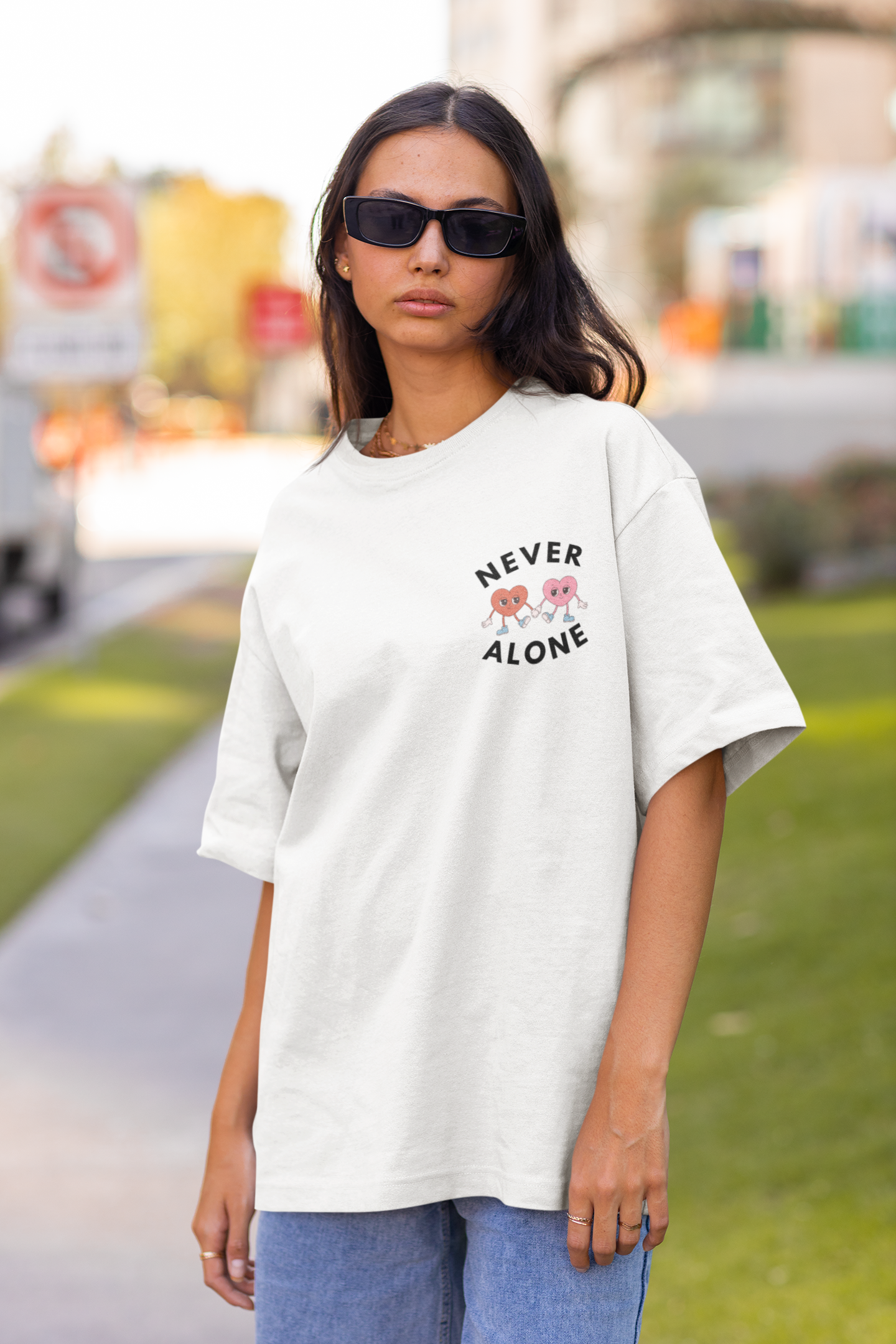 Never Alone Graphic Tee product thumbnail image Never Alone Graphic Tee product thumbnail image