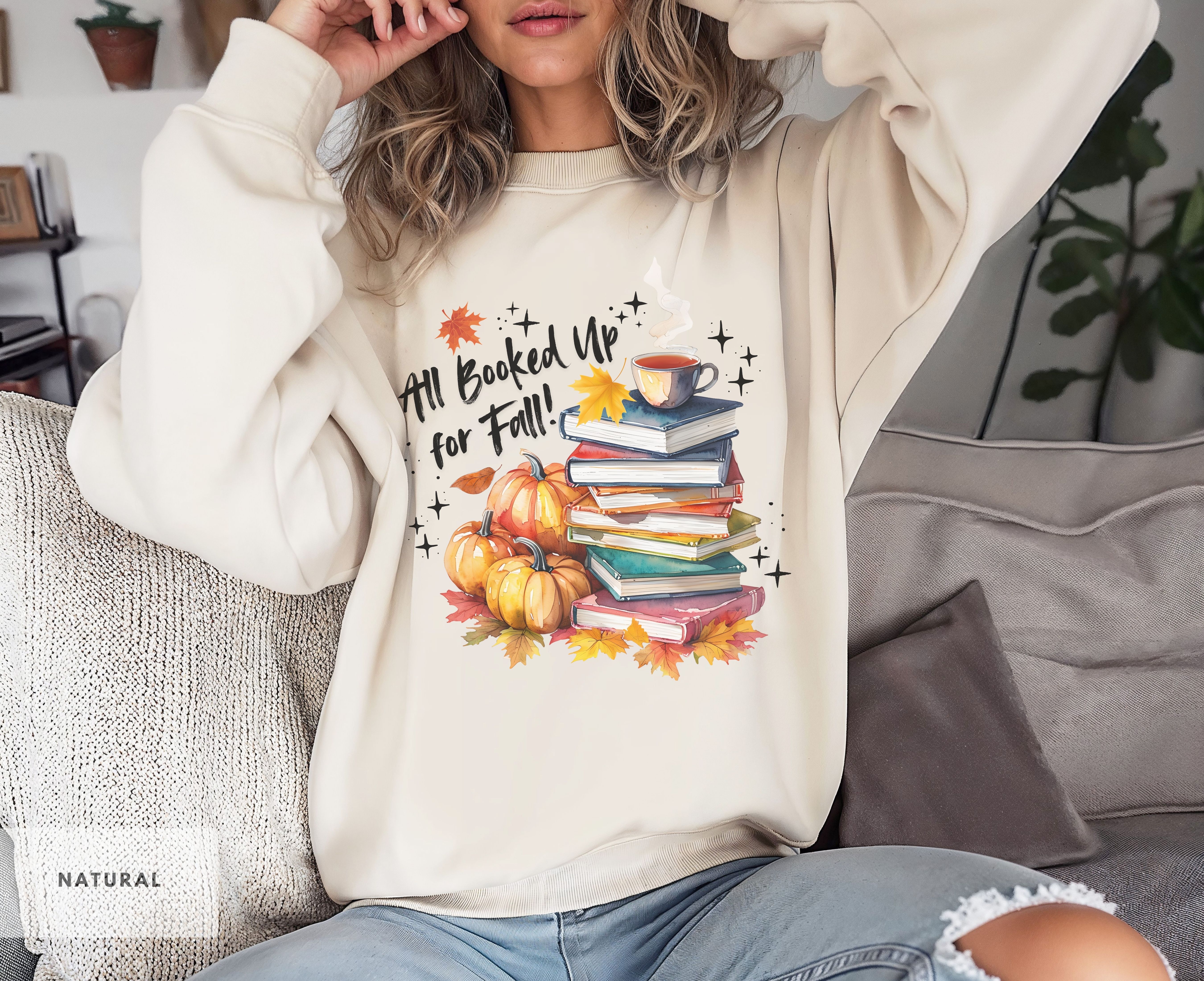 Cozy Fall themed sweatshirt for readers, Book Stack with Pumpkins and cup of tea, All Booked Up, Gift for Her, Teachers, students Sweatshirt product thumbnail image Cozy Fall themed sweatshirt for readers, Book Stack with Pumpkins and cup of tea, All Booked Up, Gift for Her, Teachers, students Sweatshirt product thumbnail image
