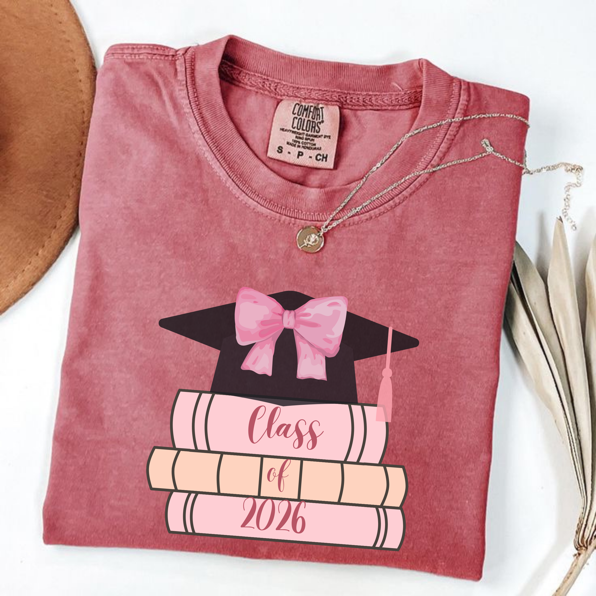 Graduation Celebration T-Shirt, Class of 2026 Shirt, Unisex Gift for Graduates, College Graduation Tee, Book and Cap Design Tee product thumbnail image Graduation Celebration T-Shirt, Class of 2026 Shirt, Unisex Gift for Graduates, College Graduation Tee, Book and Cap Design Tee product thumbnail image