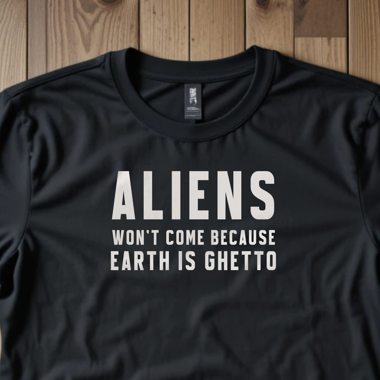 Unisex Softstyle T-Shirt with 'Aliens Won't Come Because Earth is Ghetto' Design - Funny Graphic Tee, Casual Wear, Gift for Space [...]