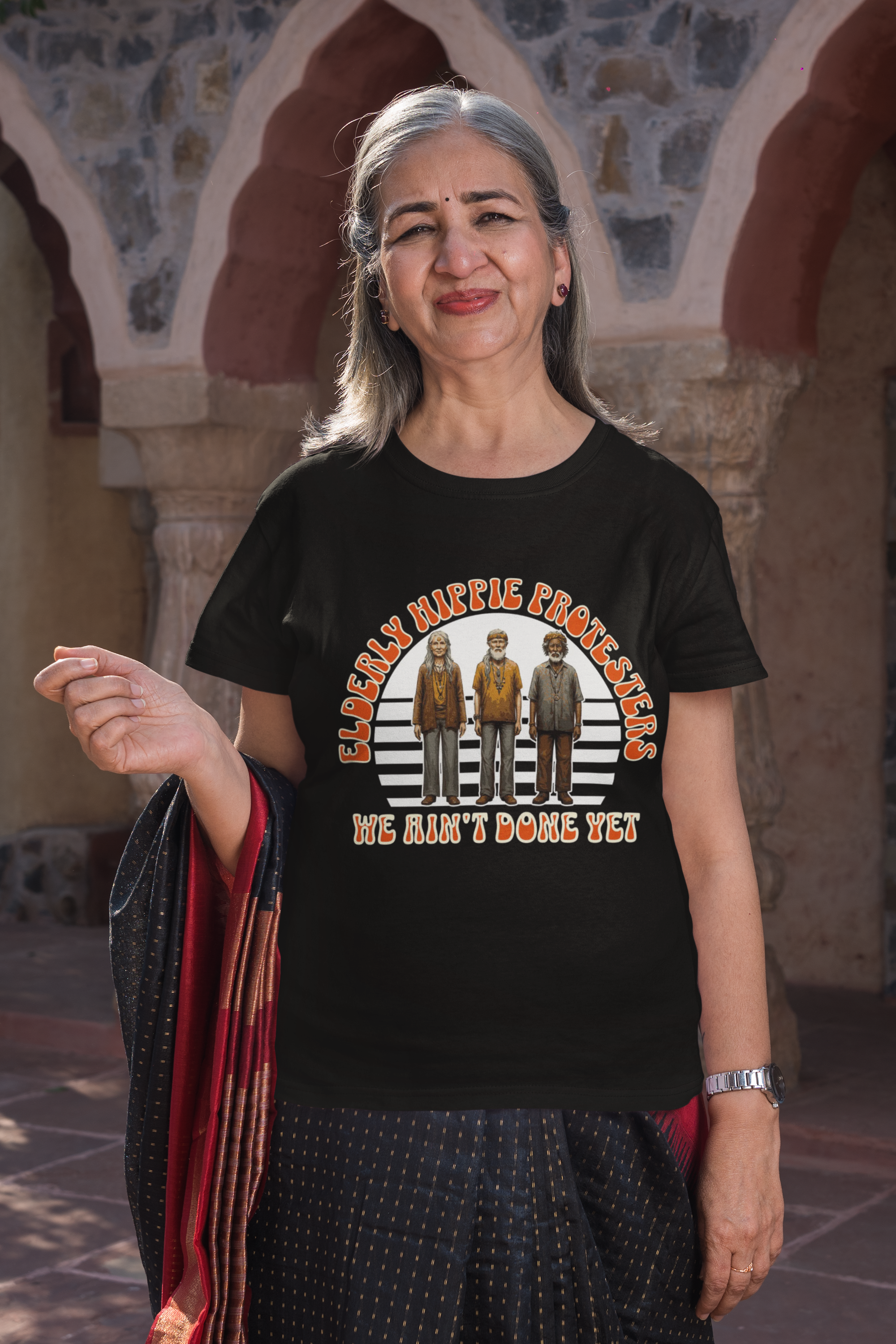 Elderly Hippie Protesters T-Shirt - We Ain't Done Yet. product thumbnail image