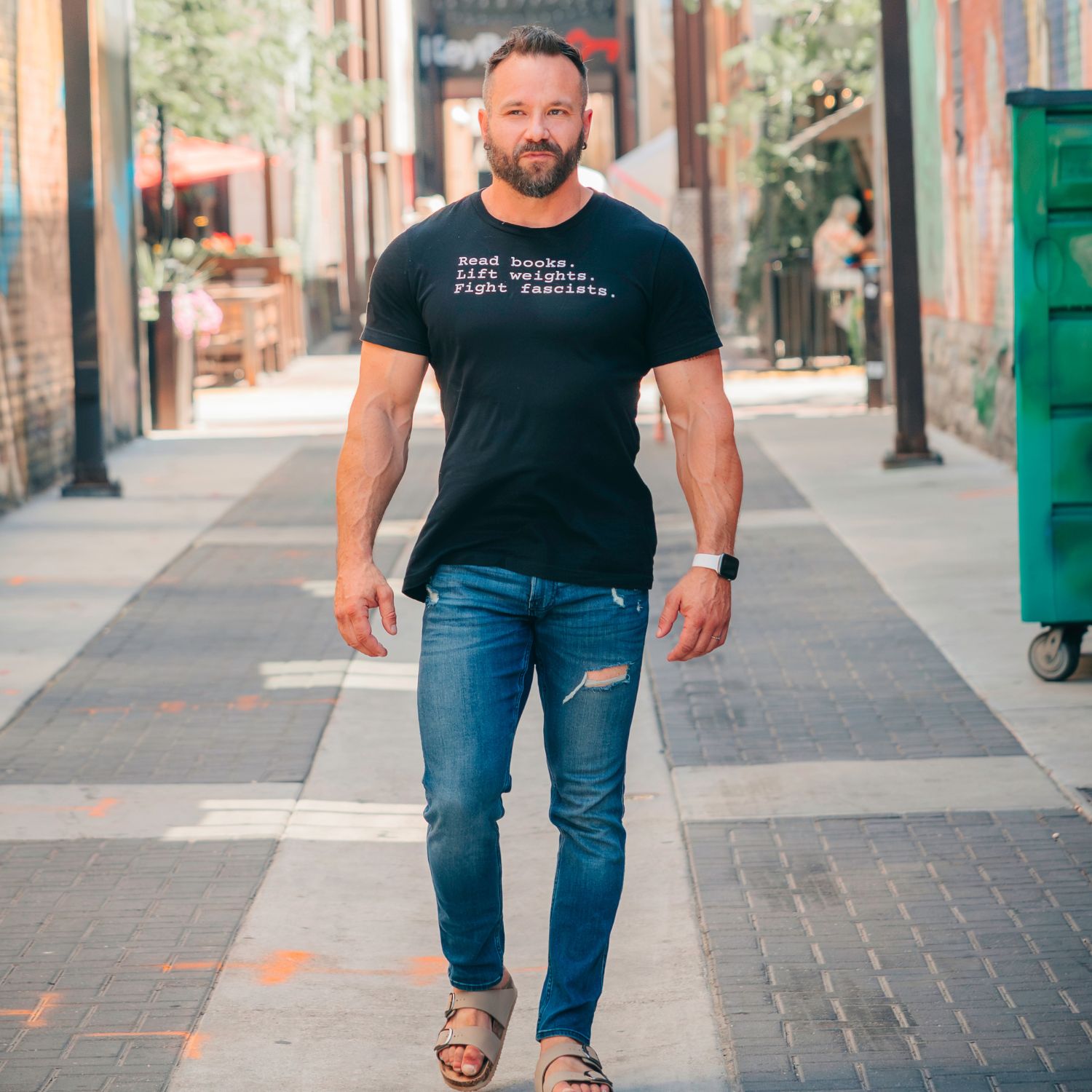 "Read Books. Lift Weights. Fight Fascists." Unisex Tee product thumbnail image "Read Books. Lift Weights. Fight Fascists." Unisex Tee product thumbnail image