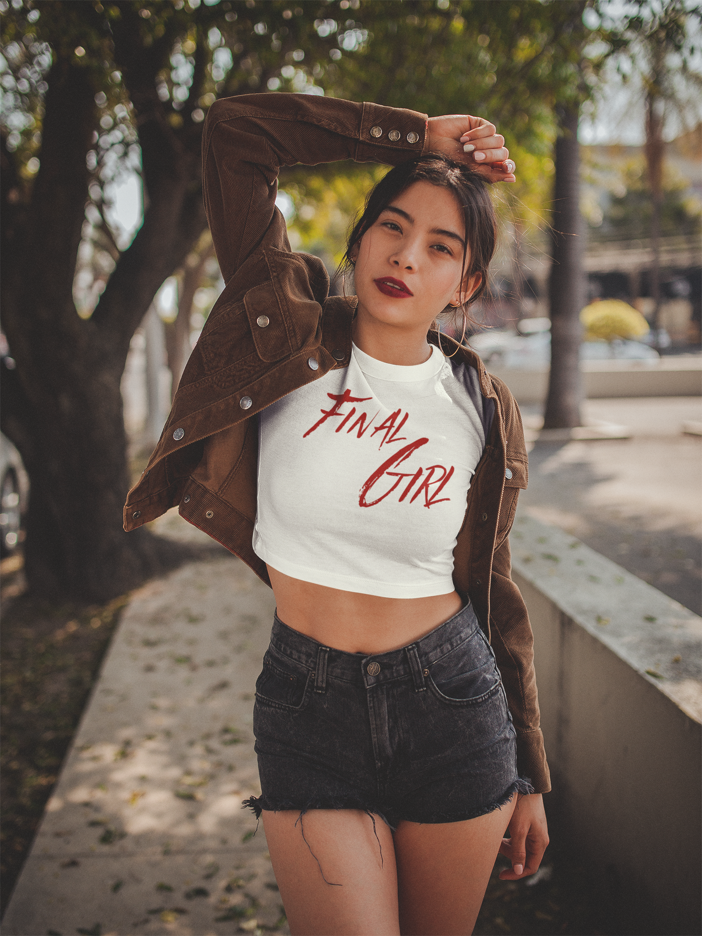 Women's Crop Top, Final Girl Graphic Tee, Music Festival Shirt, Summer Outfit, Horror Movie Top, Casual Crop Tee product thumbnail image Women's Crop Top, Final Girl Graphic Tee, Music Festival Shirt, Summer Outfit, Horror Movie Top, Casual Crop Tee product thumbnail image