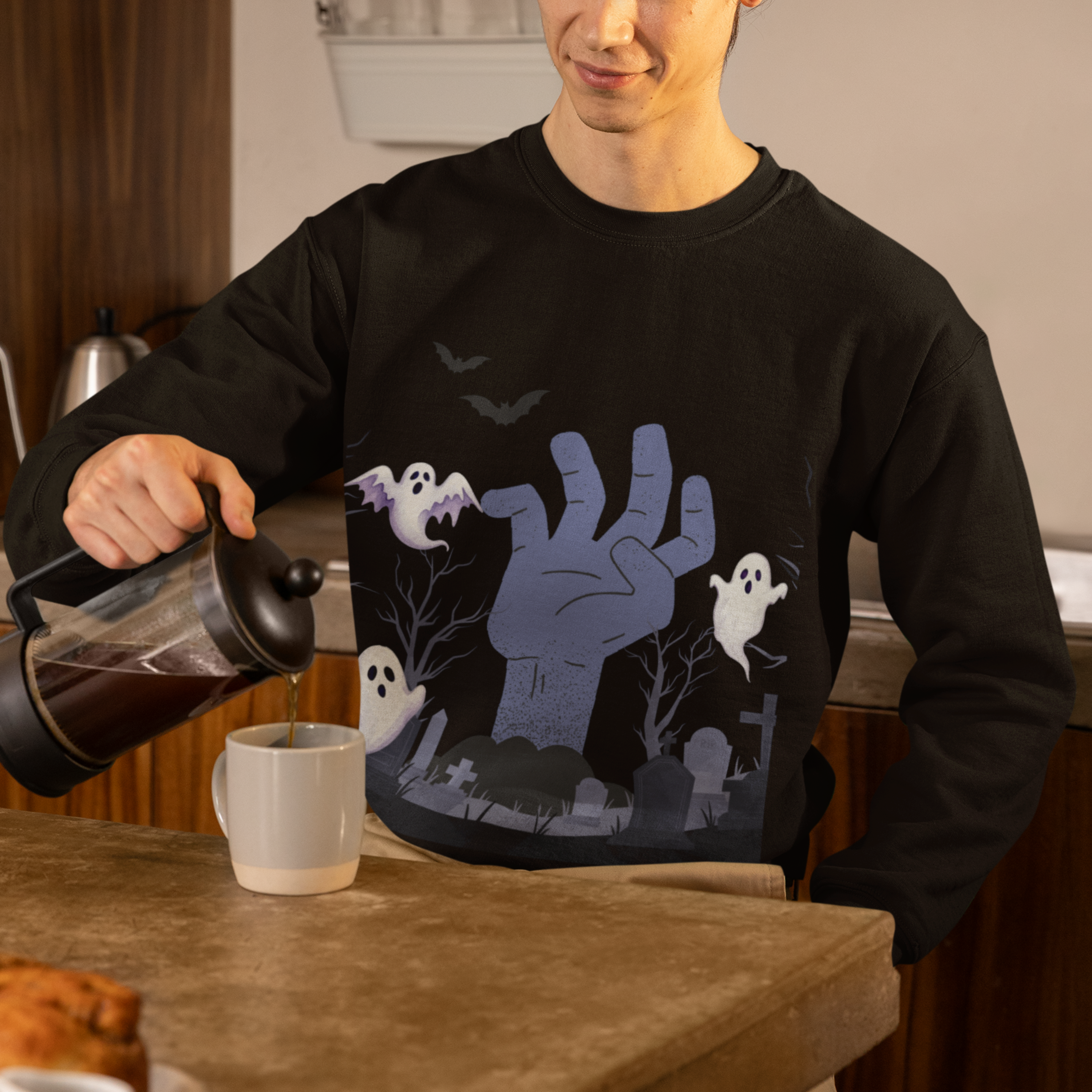 Spooky Halloween Sweatshirt | Zombie Hand & Ghosts Graveyard Scene | Creepy Cute Fall Pullover | Halloween Graphic Sweatshirt product thumbnail image Spooky Halloween Sweatshirt | Zombie Hand & Ghosts Graveyard Scene | Creepy Cute Fall Pullover | Halloween Graphic Sweatshirt product thumbnail image