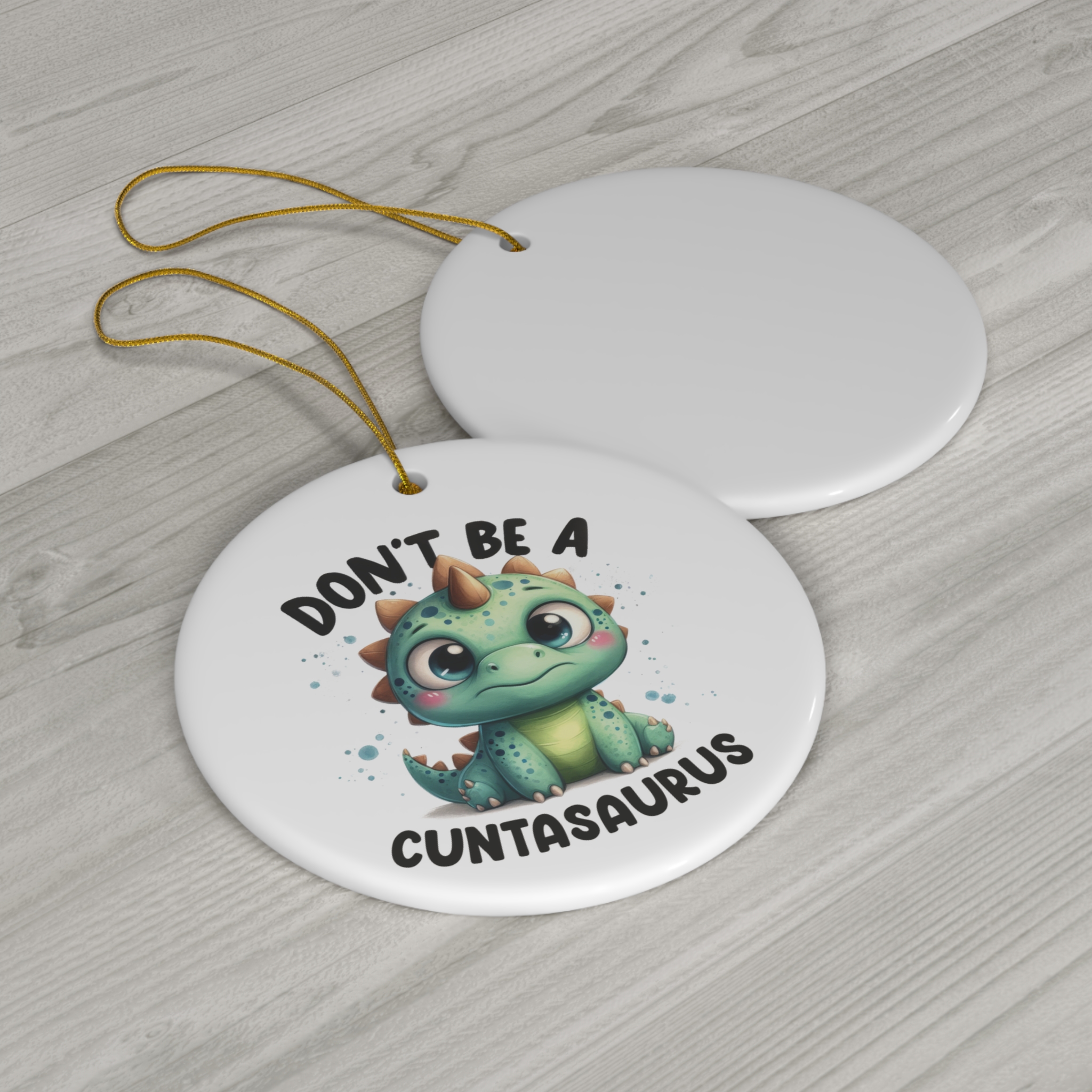 Don't Be a Cuntasaurus - Baby Dinosaur Christmas Ornament product thumbnail image Don't Be a Cuntasaurus - Baby Dinosaur Christmas Ornament product thumbnail image