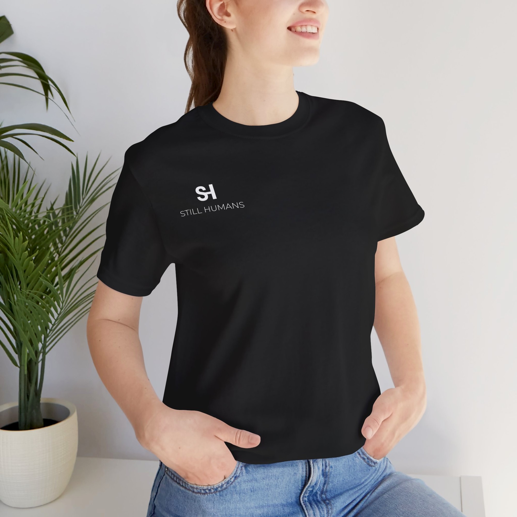 Still Humans | 'Be here now' Unisex Tee product thumbnail image Still Humans | 'Be here now' Unisex Tee product thumbnail image