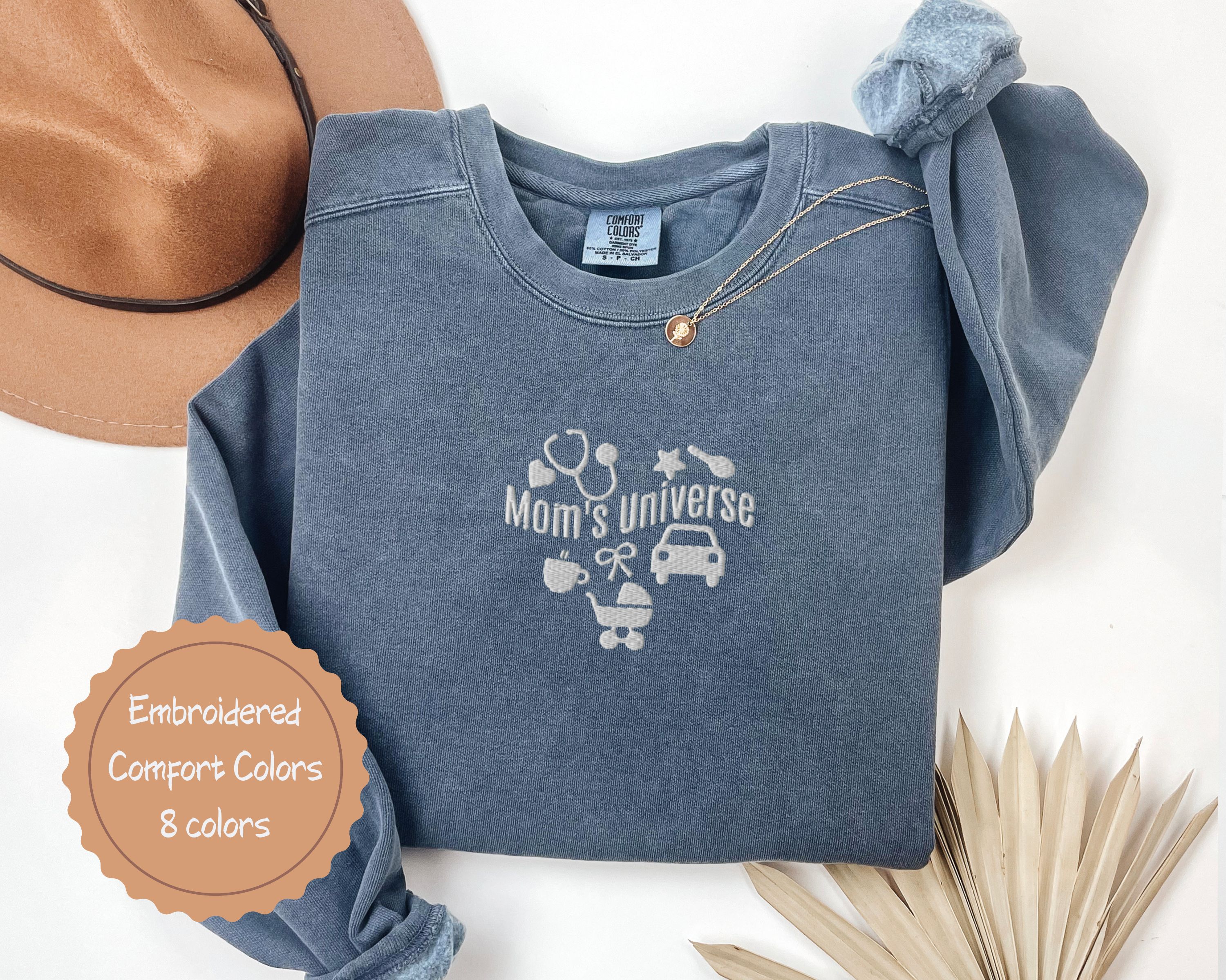 Mom’s Universe Embroidered Sweatshirt – Comfort Colors product thumbnail image Mom’s Universe Embroidered Sweatshirt – Comfort Colors product thumbnail image