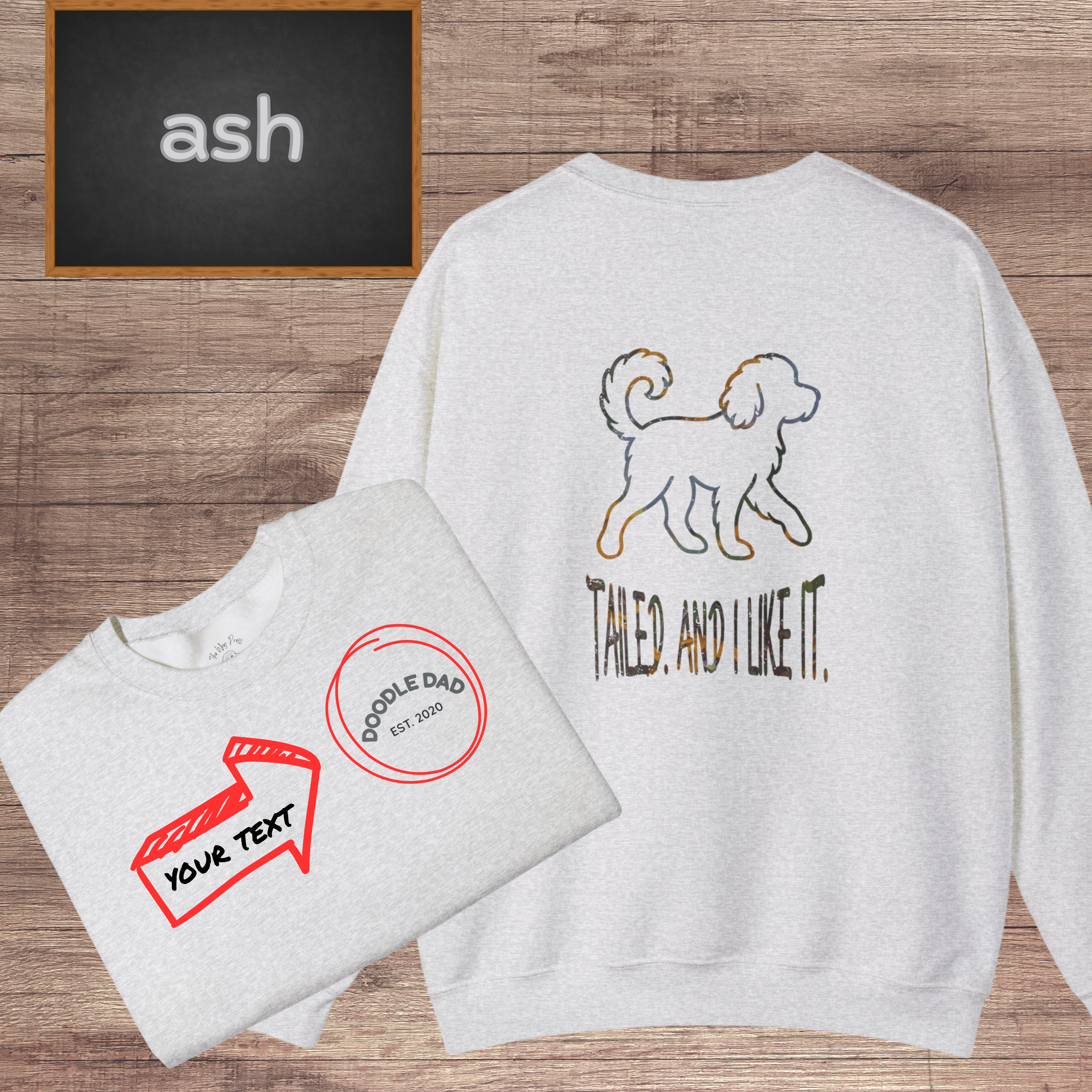 Custom dog crewneck with your pet’s name printed on the chest &amp; bold “Tailed and I Like It” back print. Perfect gift for dog moms, dads &amp; pet lovers! product thumbnail image