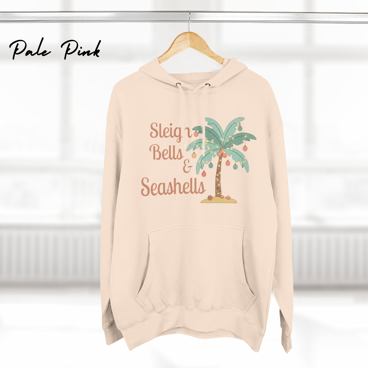 Sleigh Bells & Seashells Coastal Christmas Hoodie product thumbnail image Sleigh Bells & Seashells Coastal Christmas Hoodie product thumbnail image