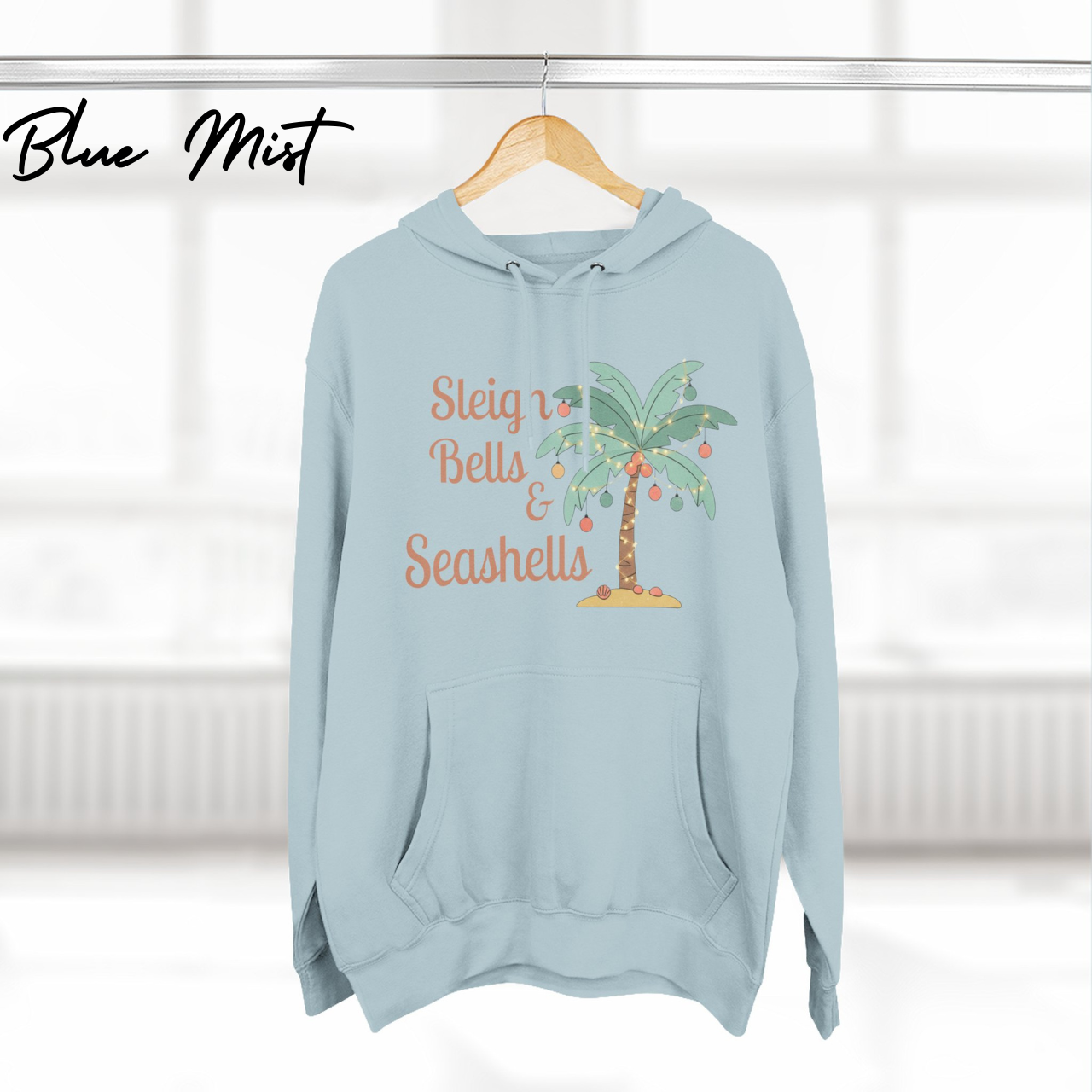 Sleigh Bells & Seashells Coastal Christmas Hoodie product thumbnail image Sleigh Bells & Seashells Coastal Christmas Hoodie product thumbnail image