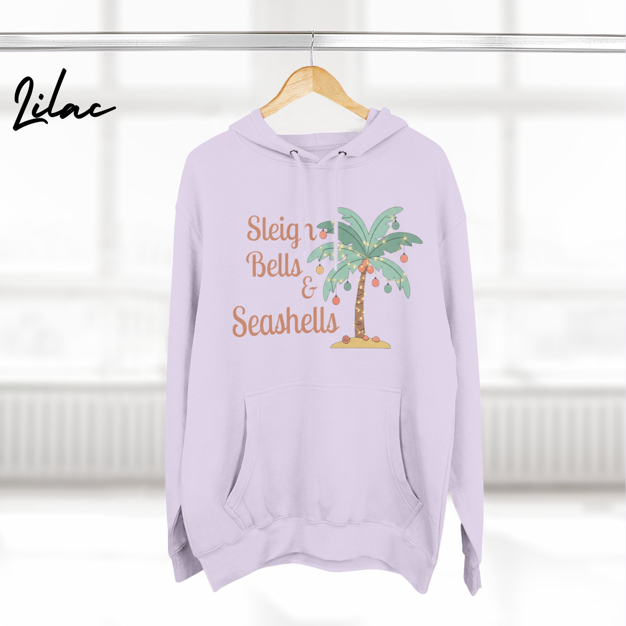 Sleigh Bells & Seashells Coastal Christmas Hoodie product thumbnail image Sleigh Bells & Seashells Coastal Christmas Hoodie product thumbnail image