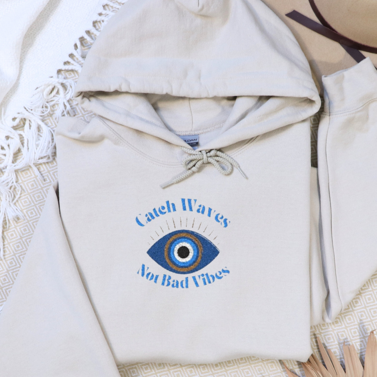 Catch Waves Not Bad Vibes Hoodie | Embroidered Evil Eye Hoodie | Coastal Protection Sweatshirt | Beachy Summer Hoodie | Good Vibes Gift product thumbnail image Catch Waves Not Bad Vibes Hoodie | Embroidered Evil Eye Hoodie | Coastal Protection Sweatshirt | Beachy Summer Hoodie | Good Vibes Gift product thumbnail image