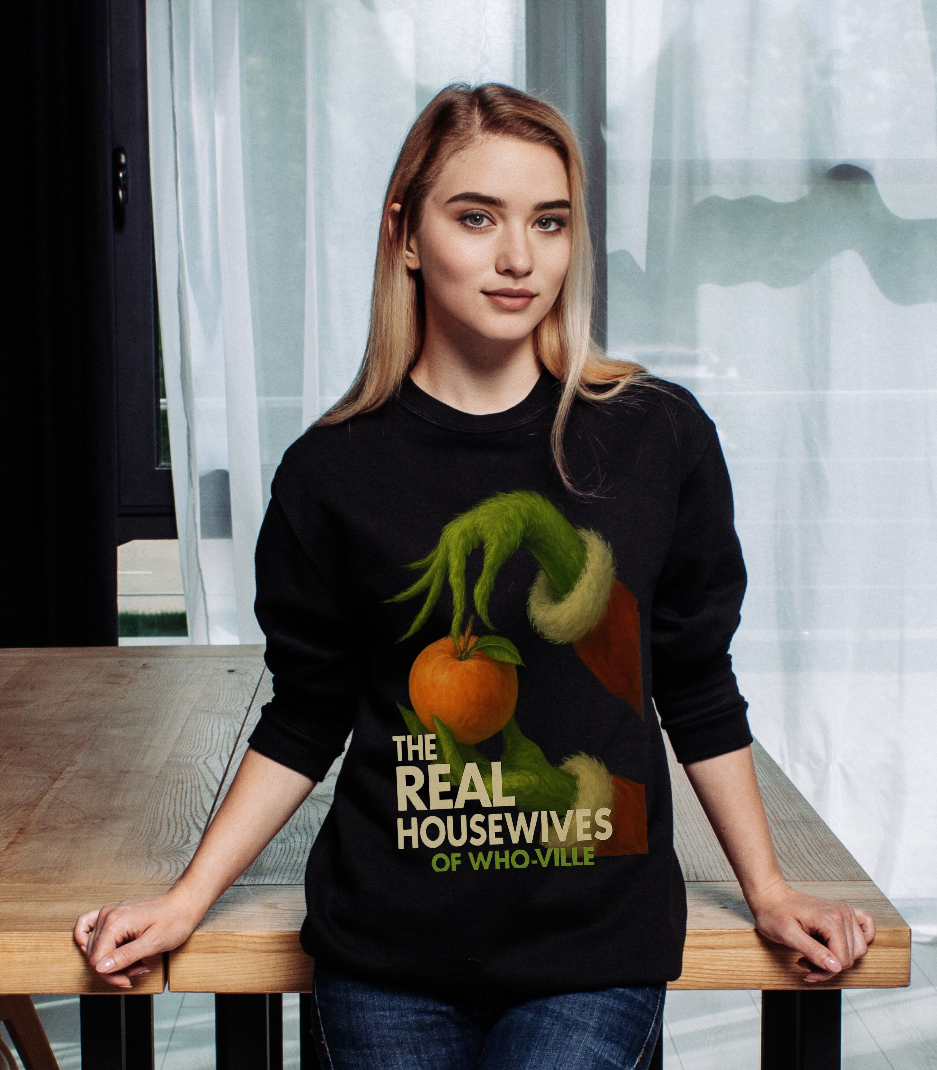 RHOWV Grinch Holiday Sweatshirt — Whimsical Grinch Hand With Ornament Crewneck