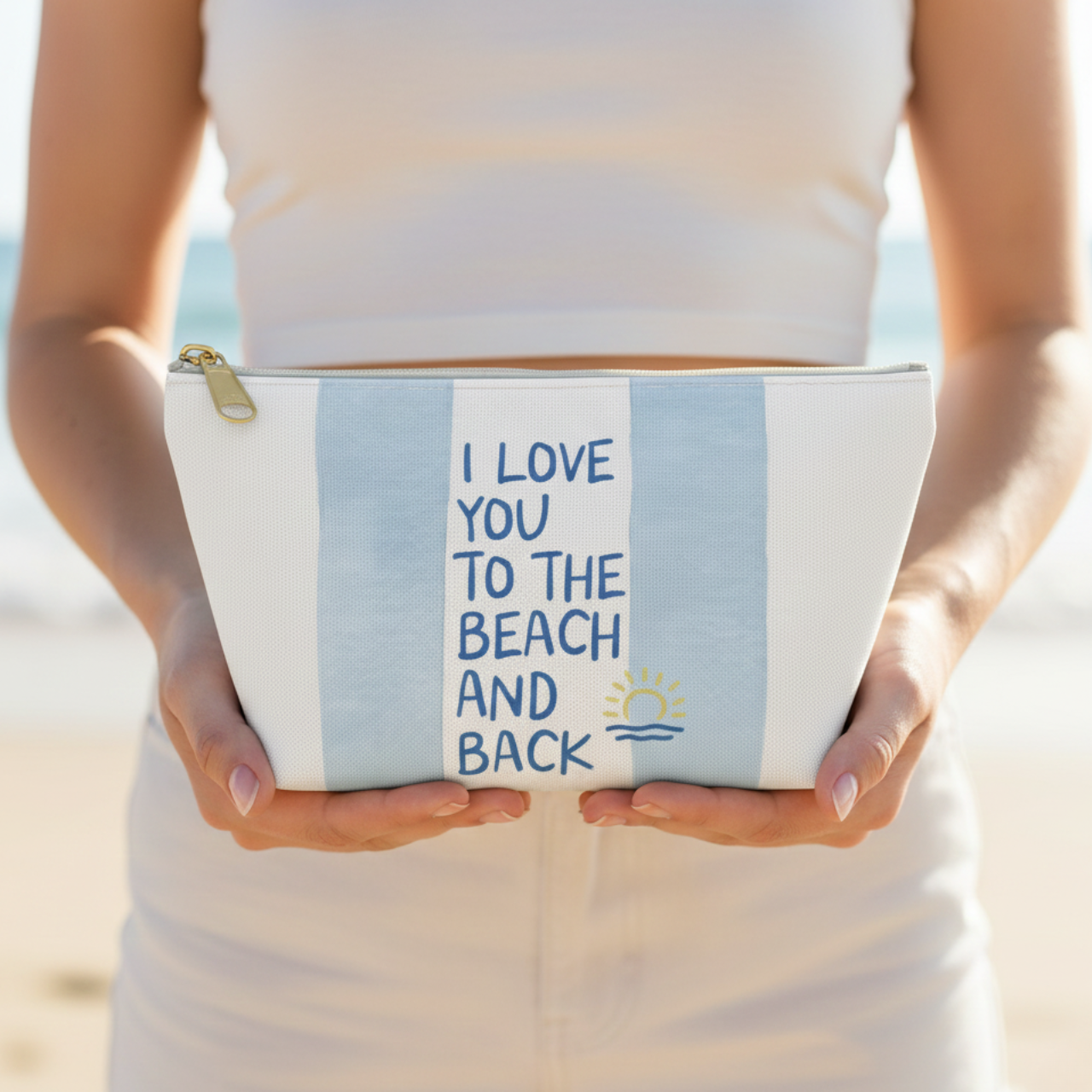 I Love You To The Beach And Back Pouch, Blue Striped Coastal Makeup Bag, Beach Lover Gift, Summer Cosmetic Bag, Ocean Lover Accessory Case product thumbnail image I Love You To The Beach And Back Pouch, Blue Striped Coastal Makeup Bag, Beach Lover Gift, Summer Cosmetic Bag, Ocean Lover Accessory Case product thumbnail image