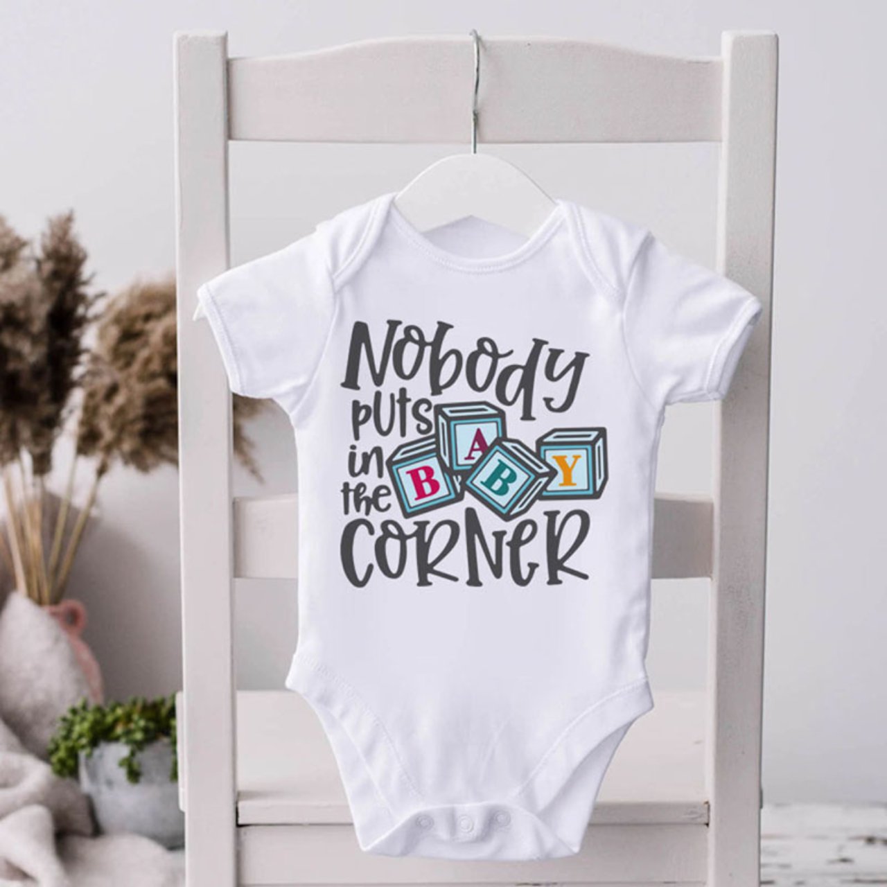 Nobody Puts Baby in the Corner Infant Bodysuit — Baby ABC Block Onesie product thumbnail image Nobody Puts Baby in the Corner Infant Bodysuit — Baby ABC Block Onesie product thumbnail image
