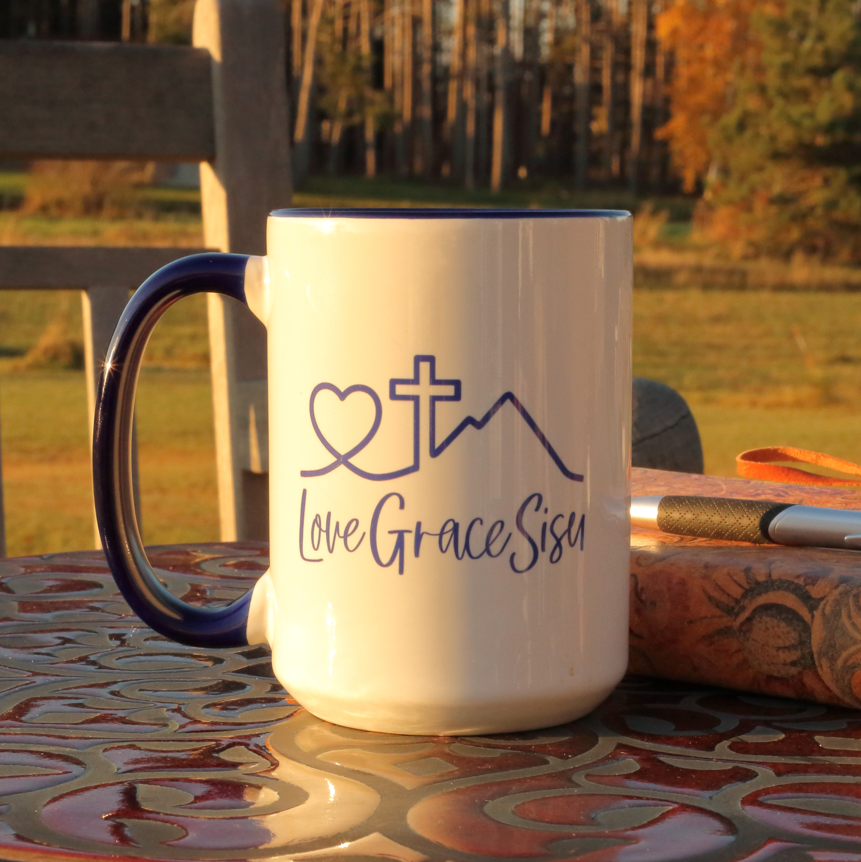 Love-Grace-Sisu with Blue Handle and Rim | Original Line Art | 11oz or 15oz product thumbnail image Love-Grace-Sisu with Blue Handle and Rim | Original Line Art | 11oz or 15oz product thumbnail image