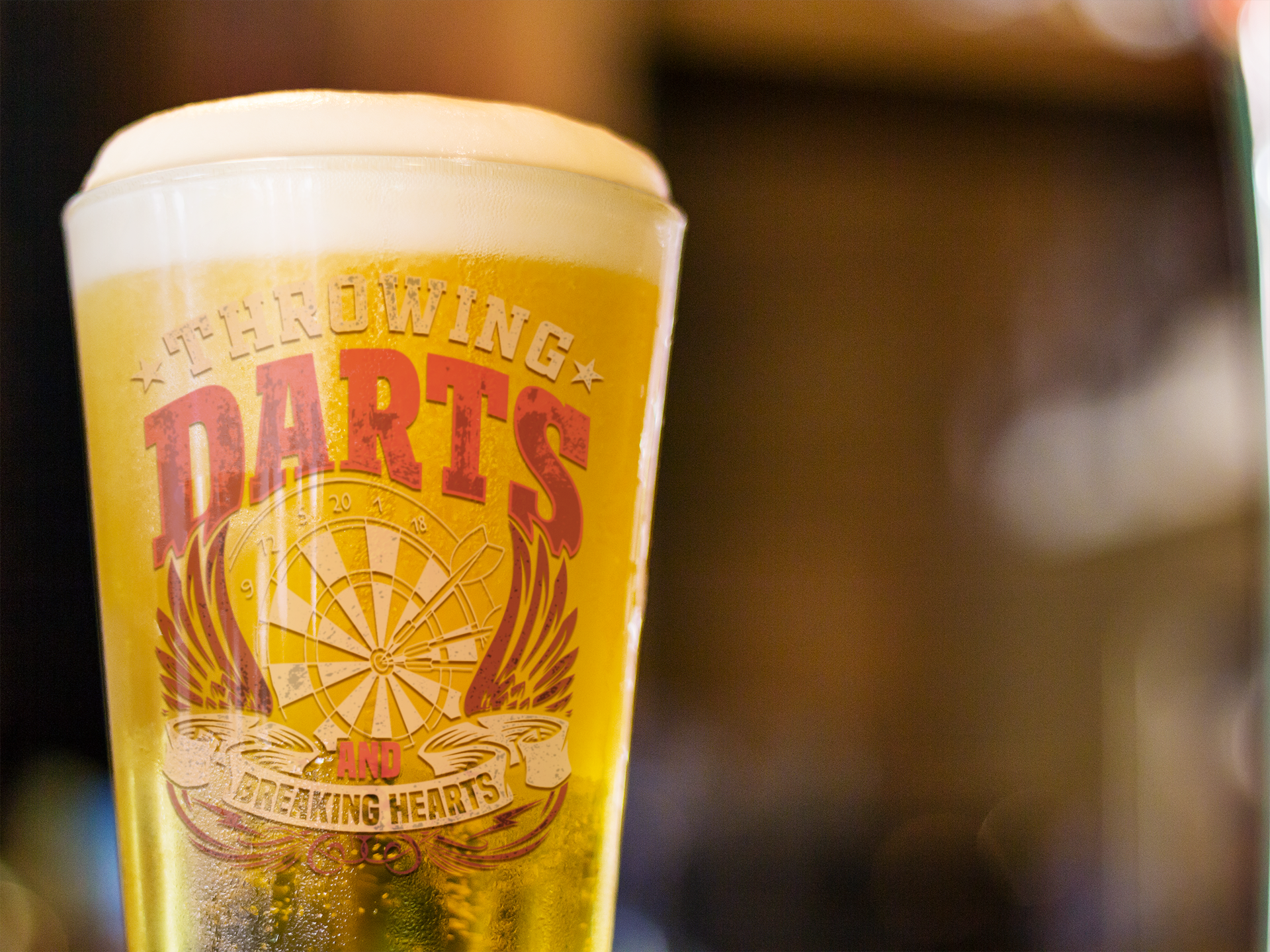 Throwing Darts and Breaking Hearts Pint Glass, 16oz product thumbnail image Throwing Darts and Breaking Hearts Pint Glass, 16oz product thumbnail image