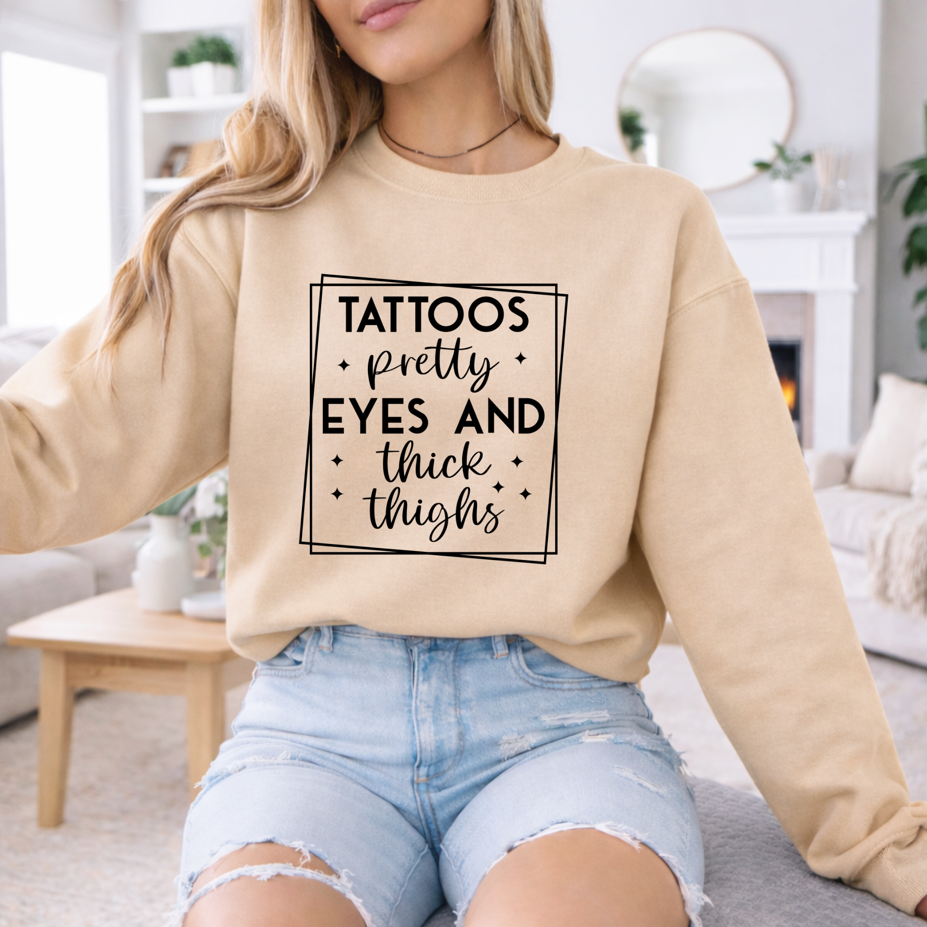 Tattoos, Pretty Eyes & Thick Thighs Sweatshirt product thumbnail image Tattoos, Pretty Eyes & Thick Thighs Sweatshirt product thumbnail image